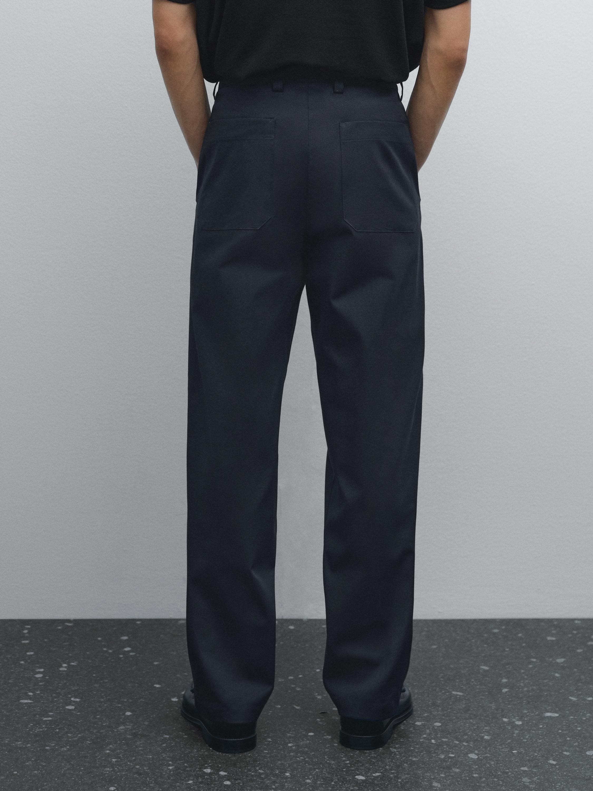 Slim fit cotton blend trousers.