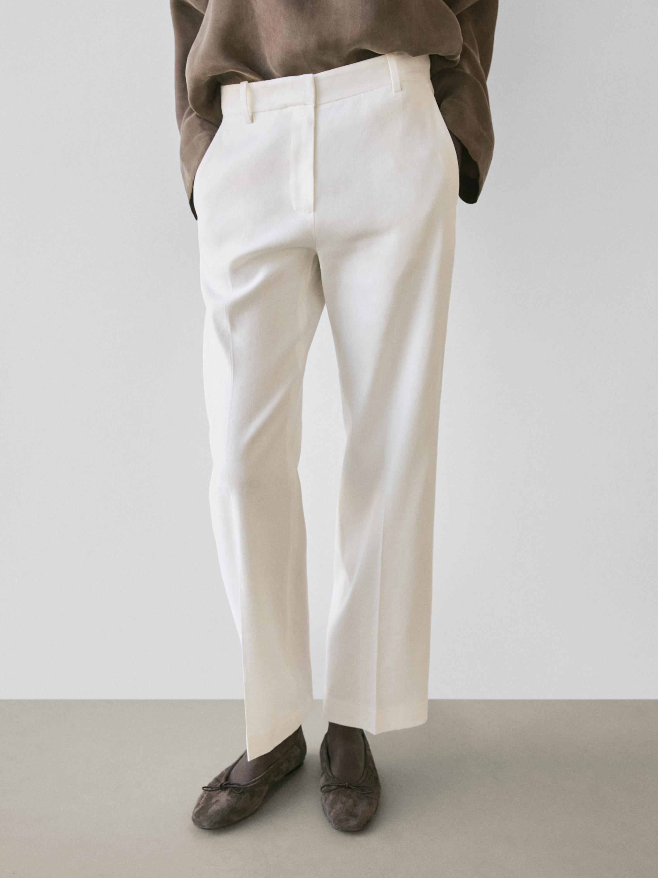 Calças straight fit com linho