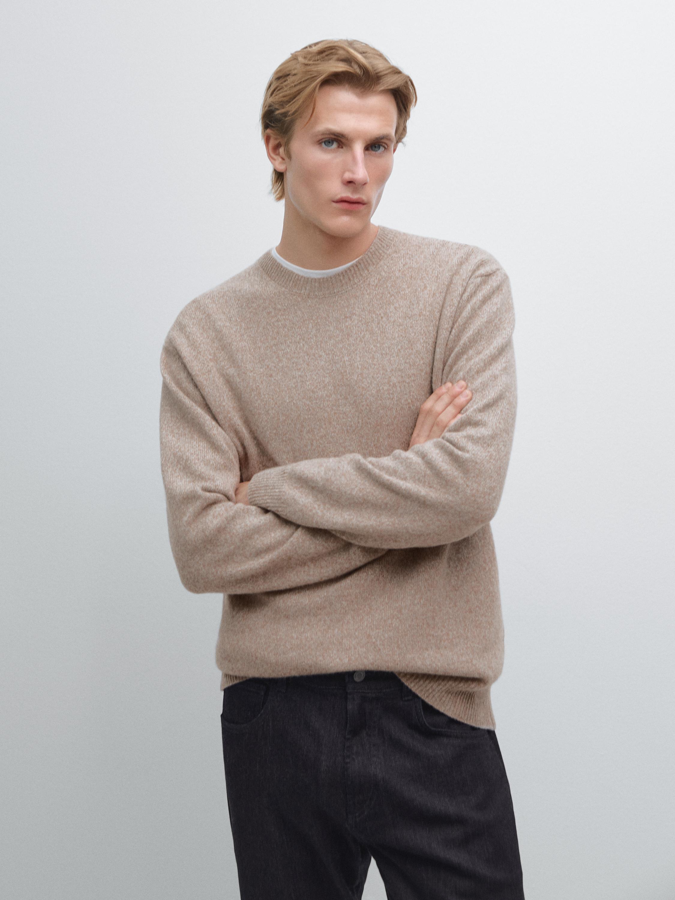 Dumaloq yoqali melanj trikotaj sviter