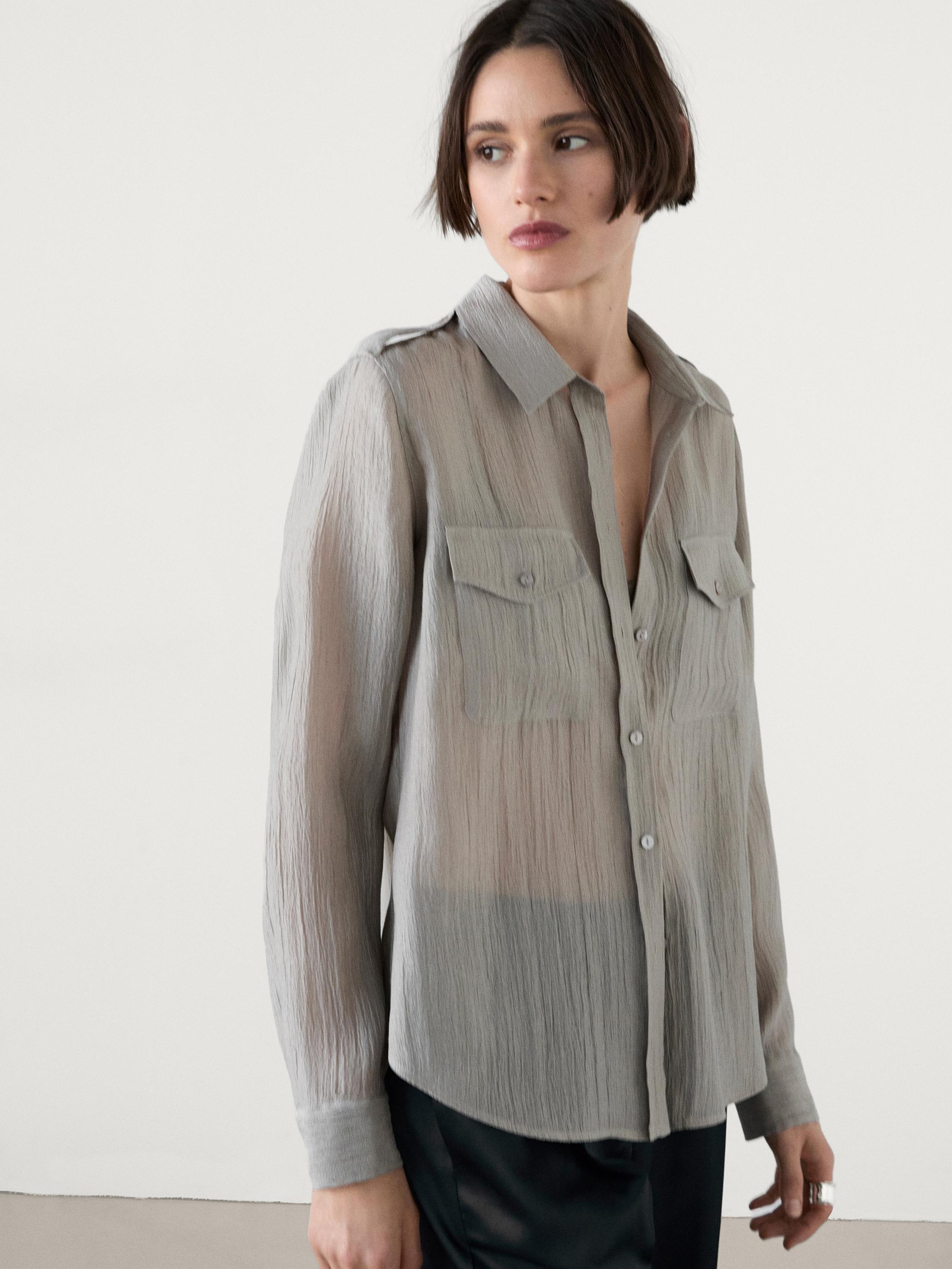 Flowing semi-sheer shirt with pockets