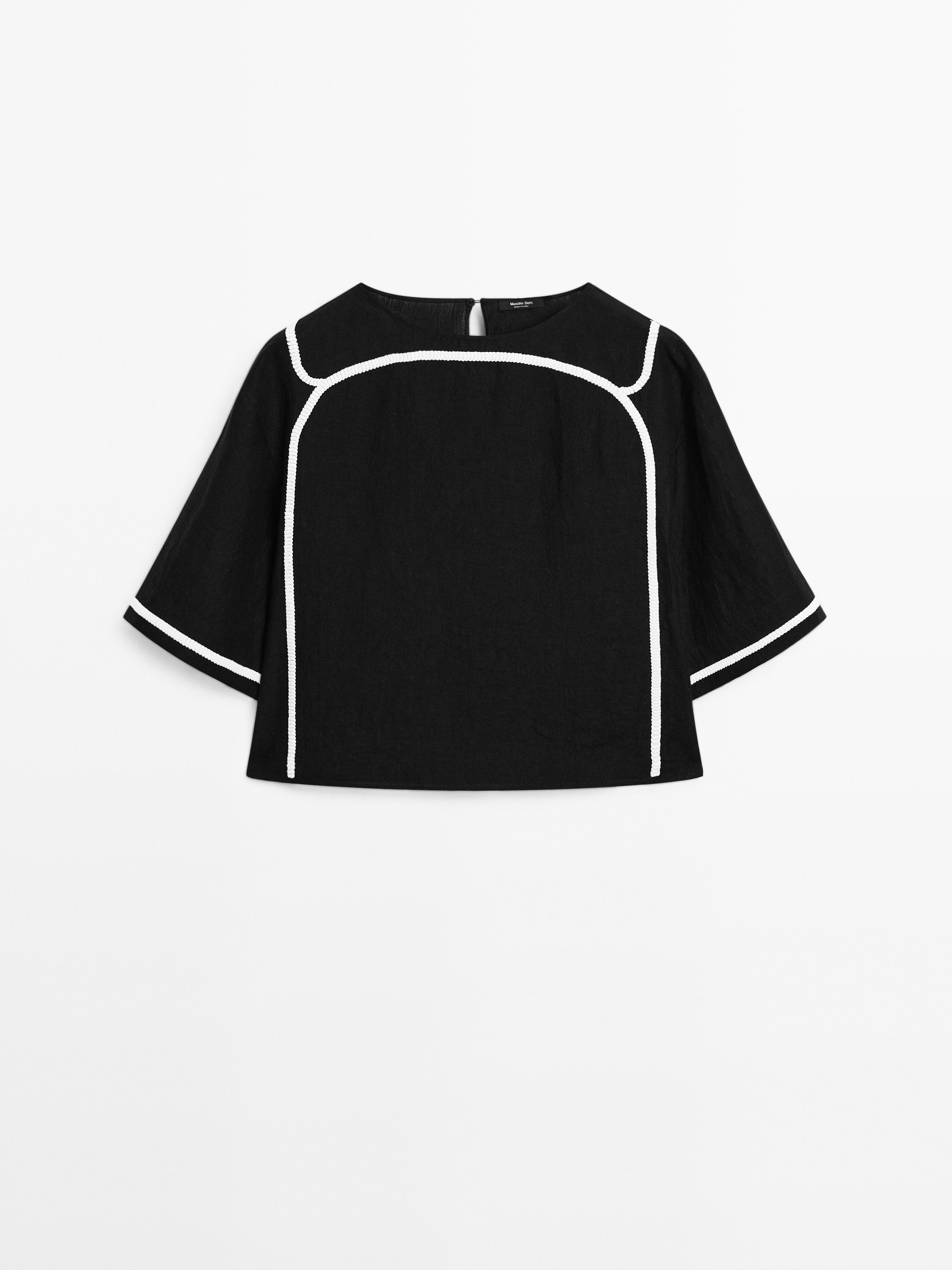 Blusa detalle bordado contraste