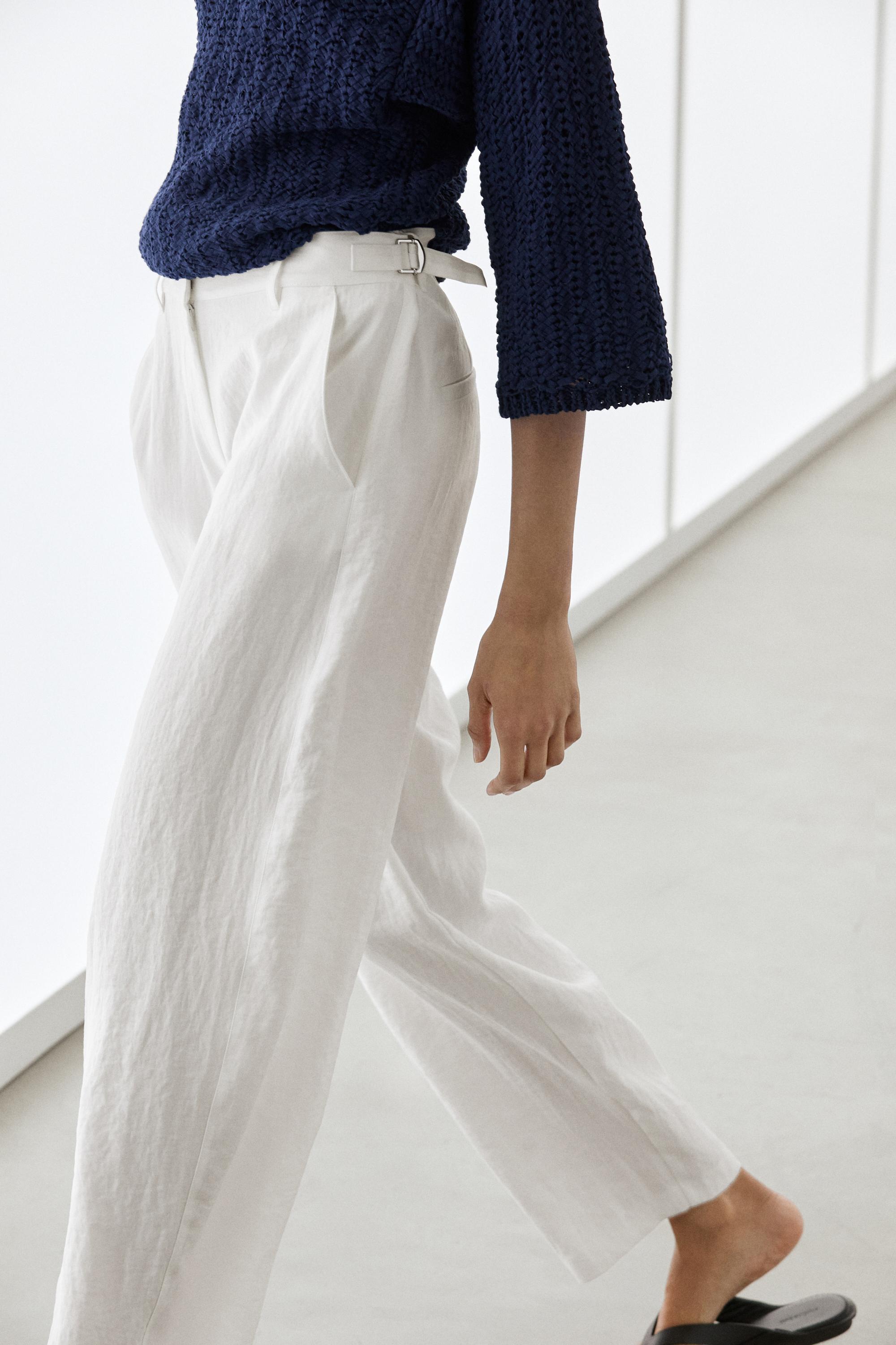 Flowing trousers with buckles — WHITE