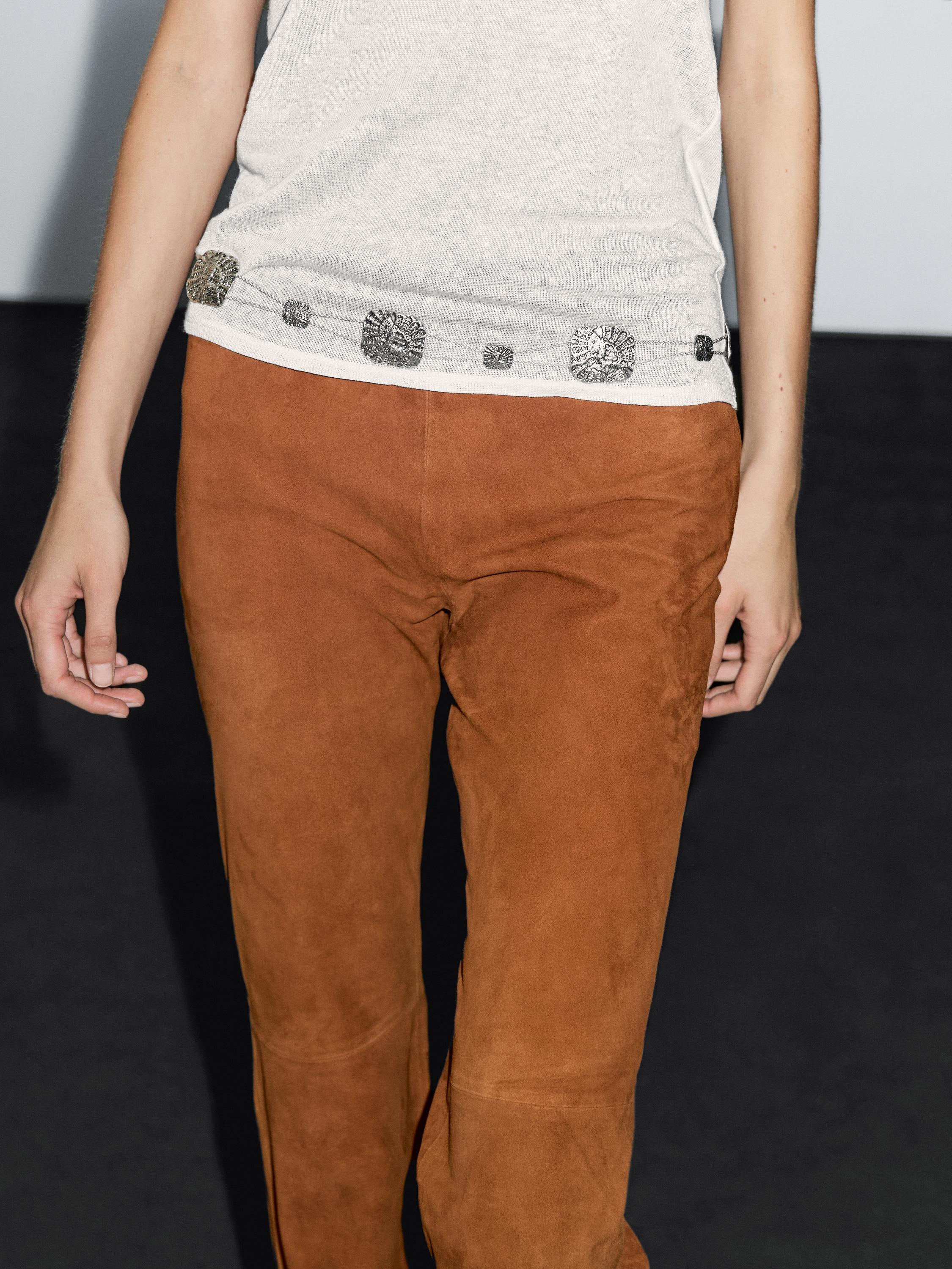 Pantalon flare en cuir finition daim