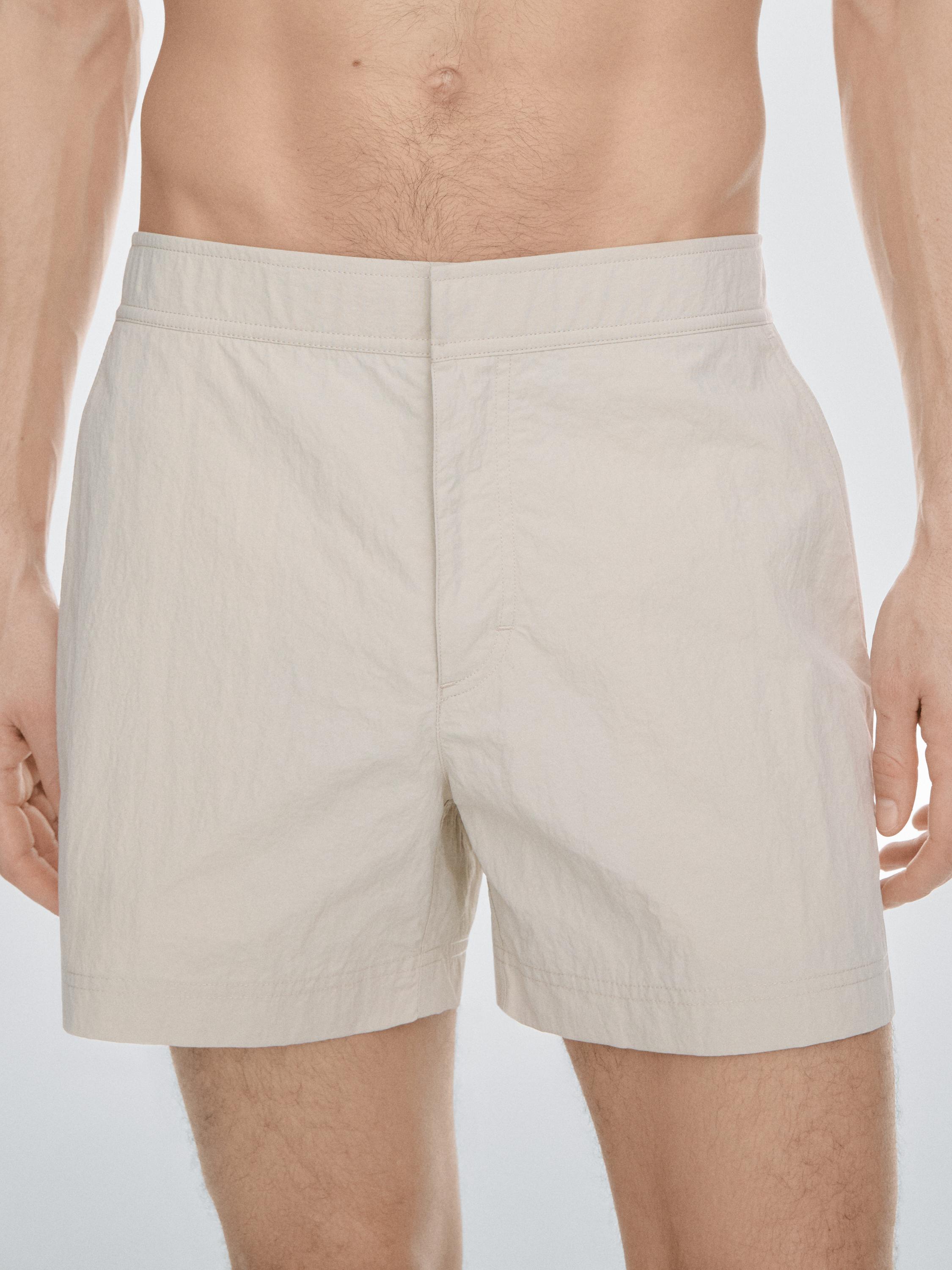 Plain swimming trunks with waist detail — SAND