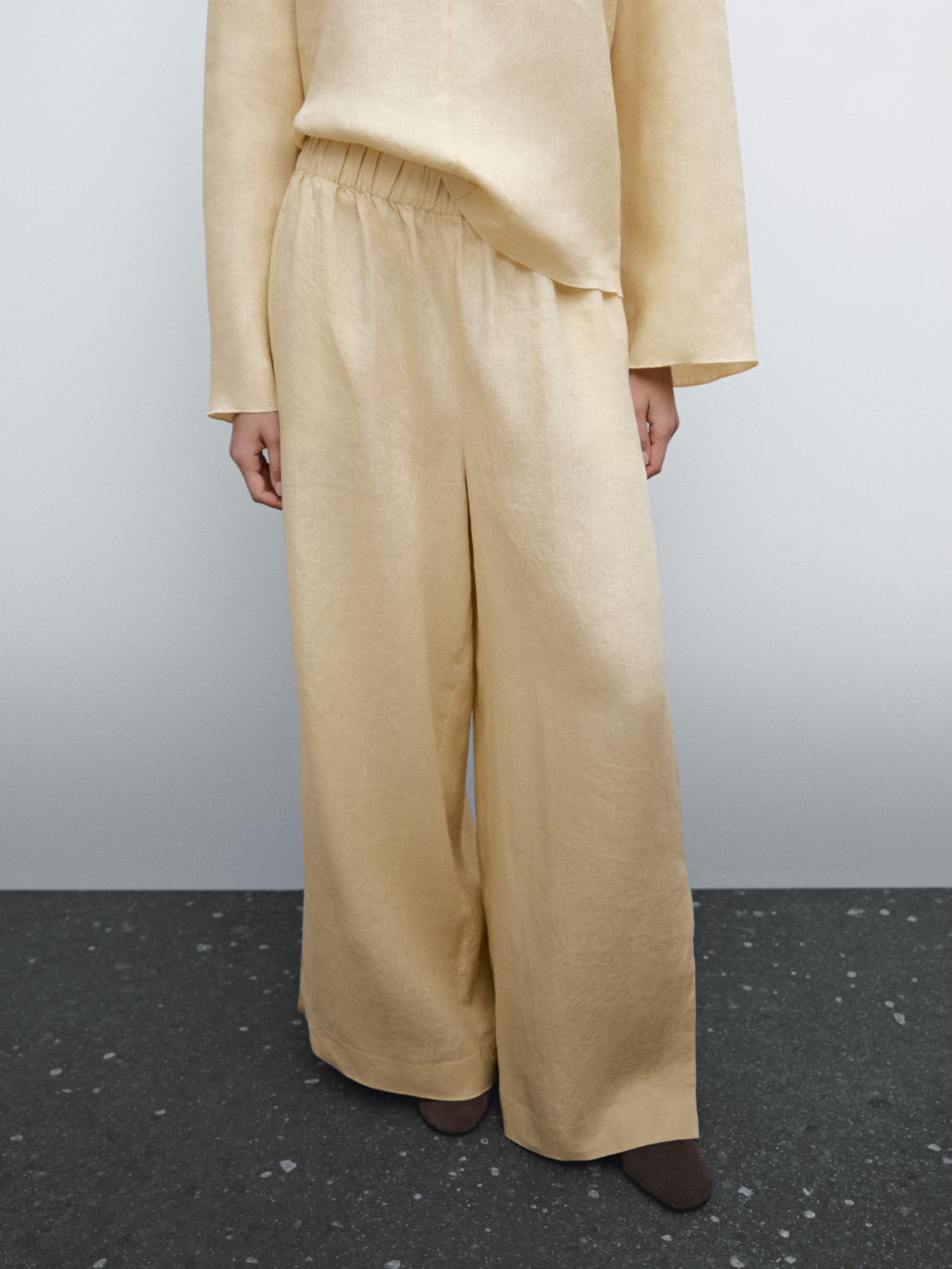 Flowing 100% linen trousers with elastic detail
