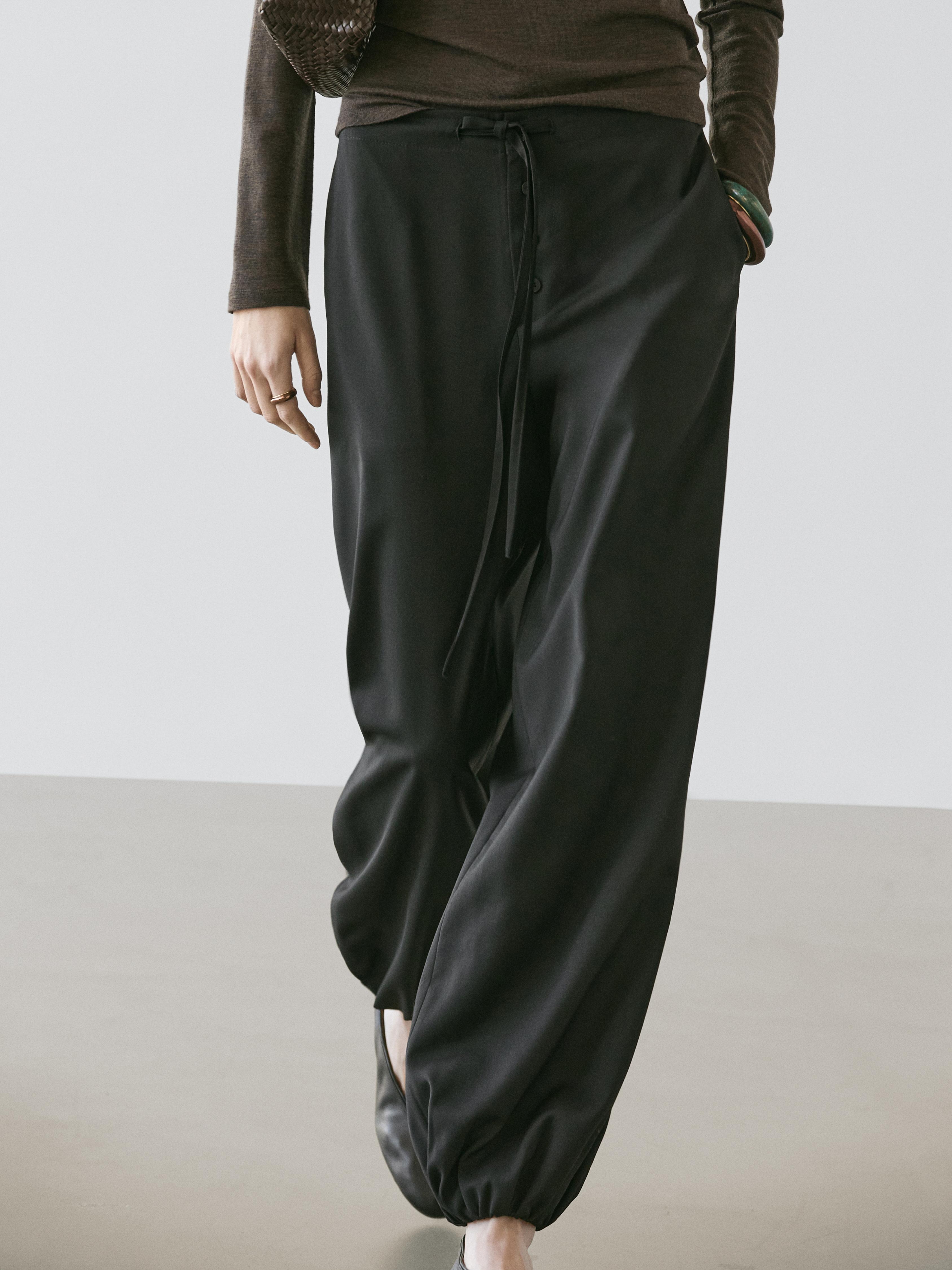 Wool sarouel trousers with tie detail — BLACK