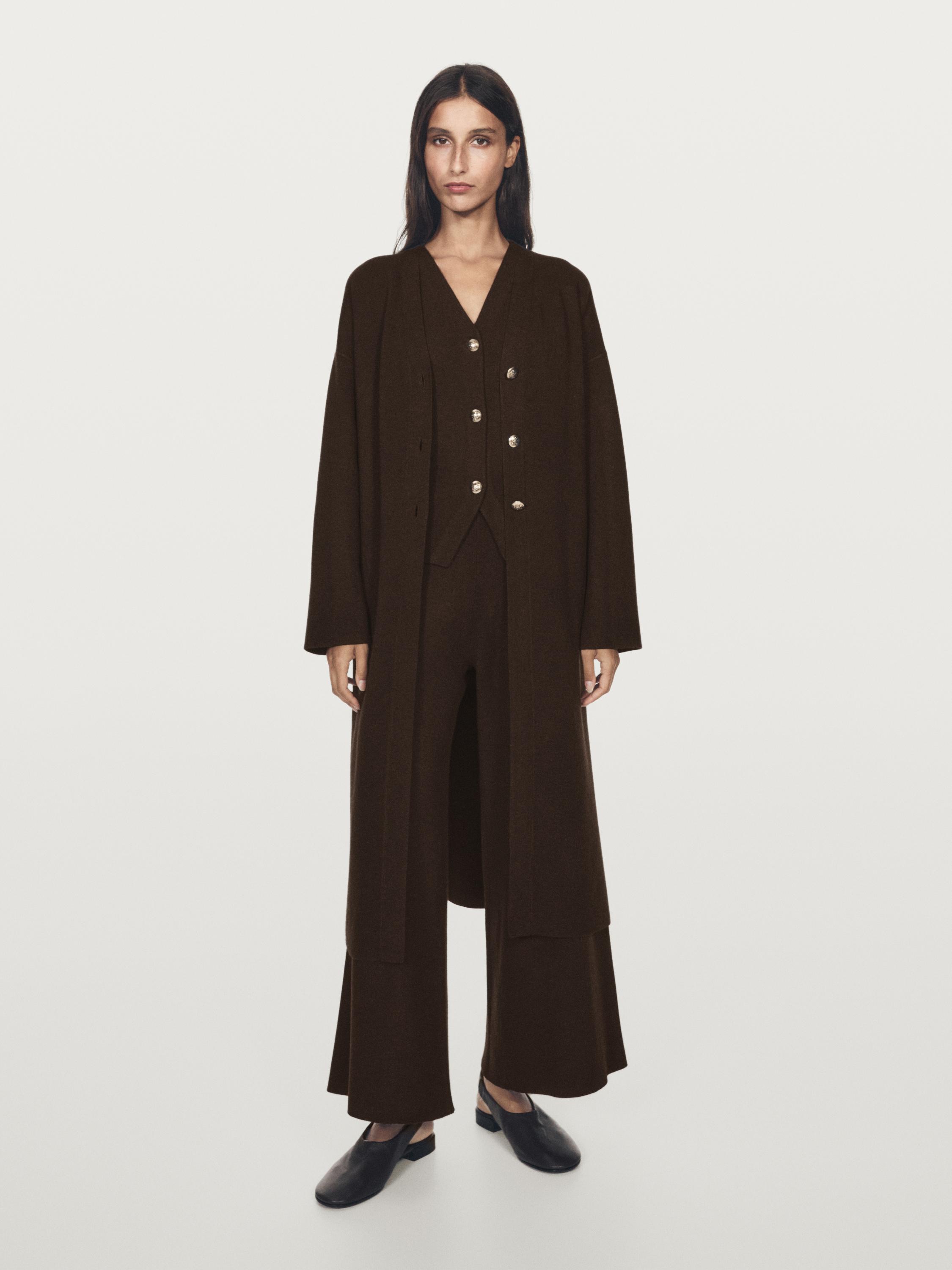 Long knit cardigan with golden buttons