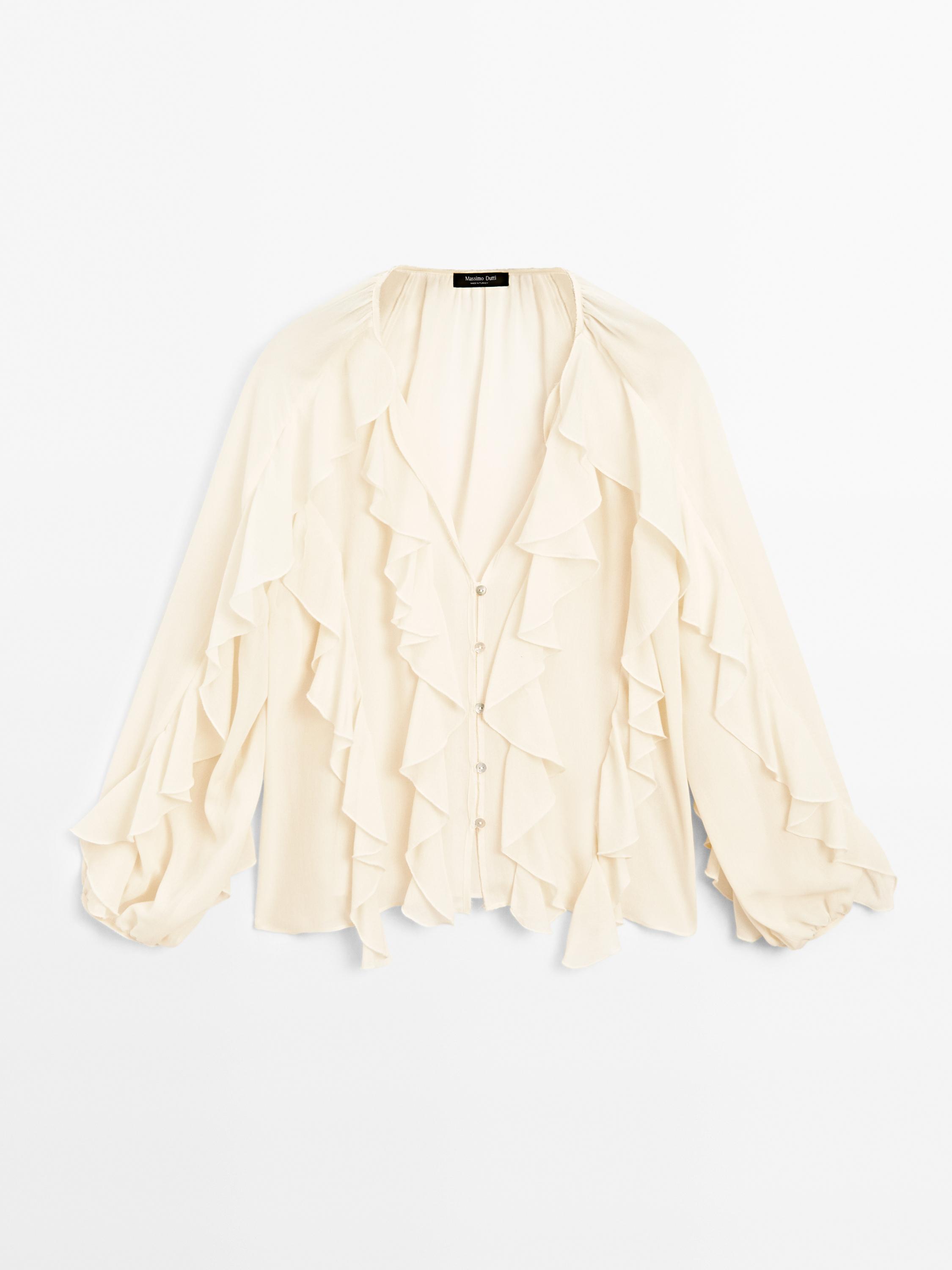 Blusa fluida detalle volantes