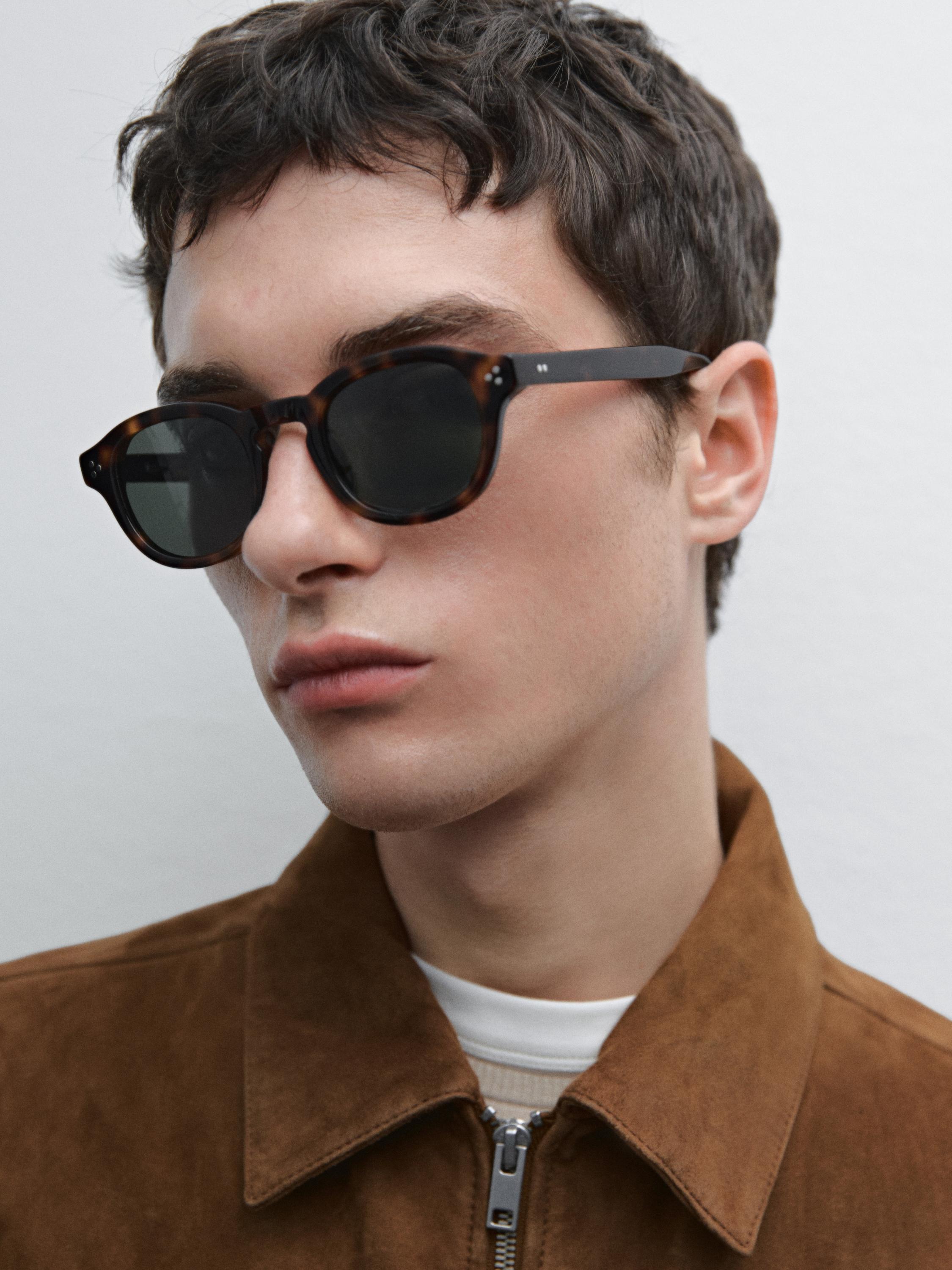 Round tortoiseshell-effect sunglasses