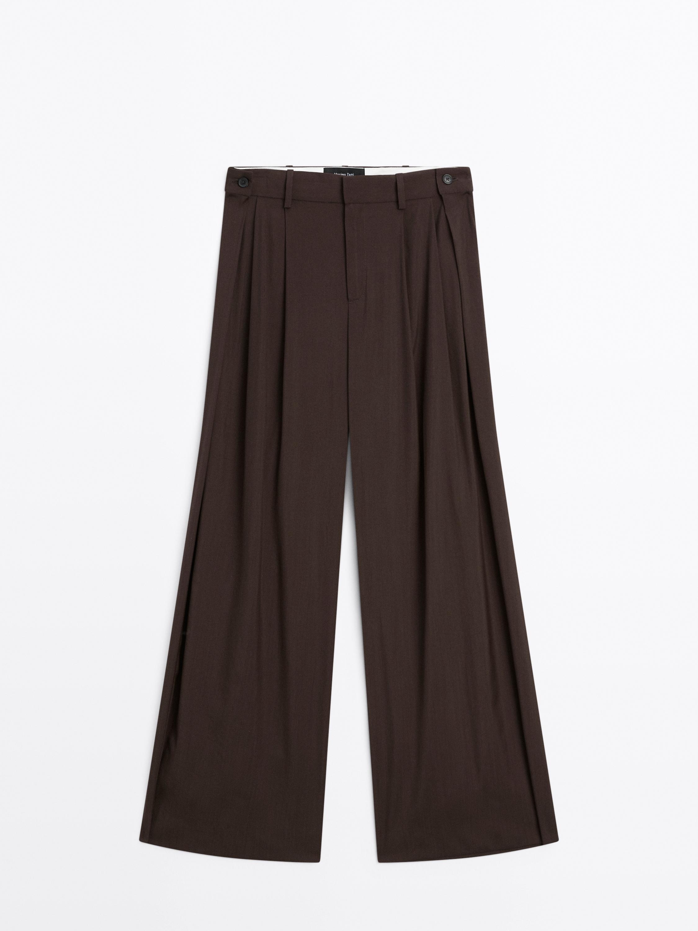 Flowing trousers with darts