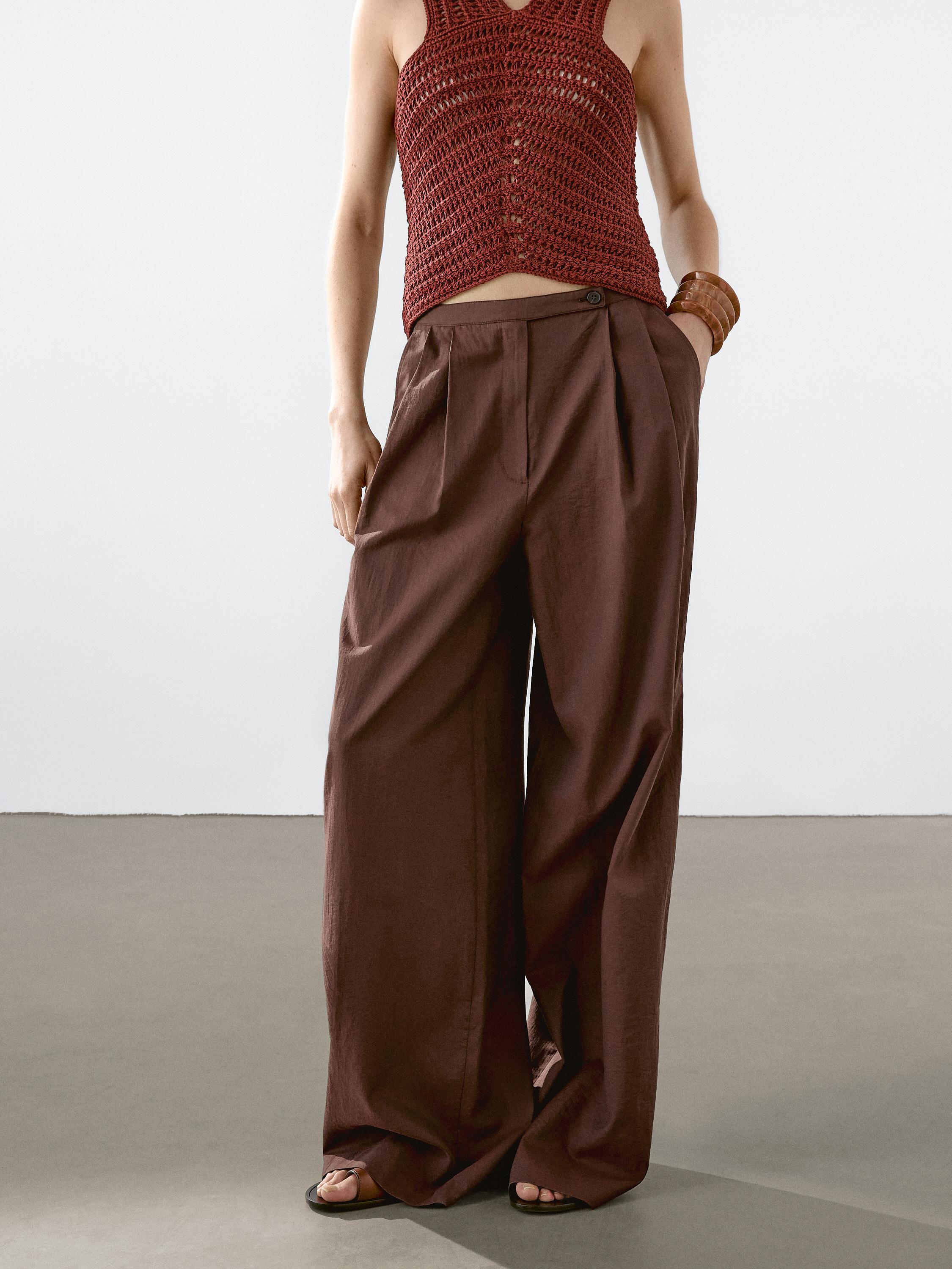 Flowing trousers with double darts