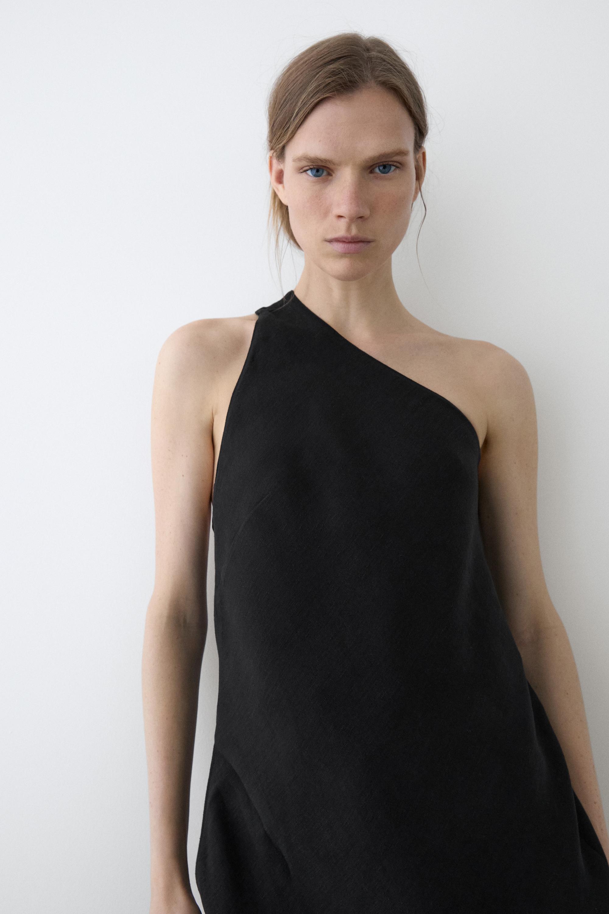 Asymmetric linen blend top with back detail