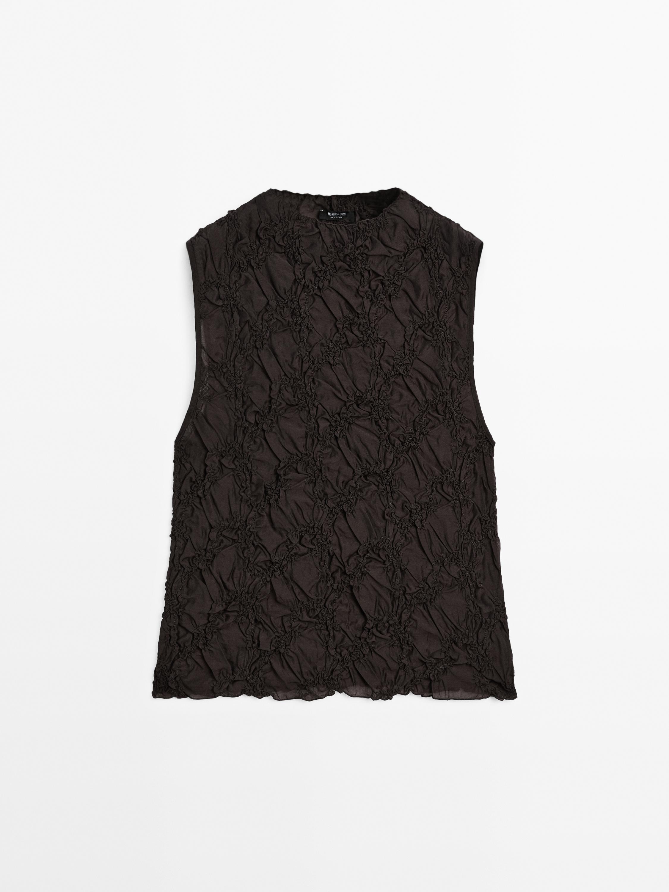 Creased-effect funnel neck top