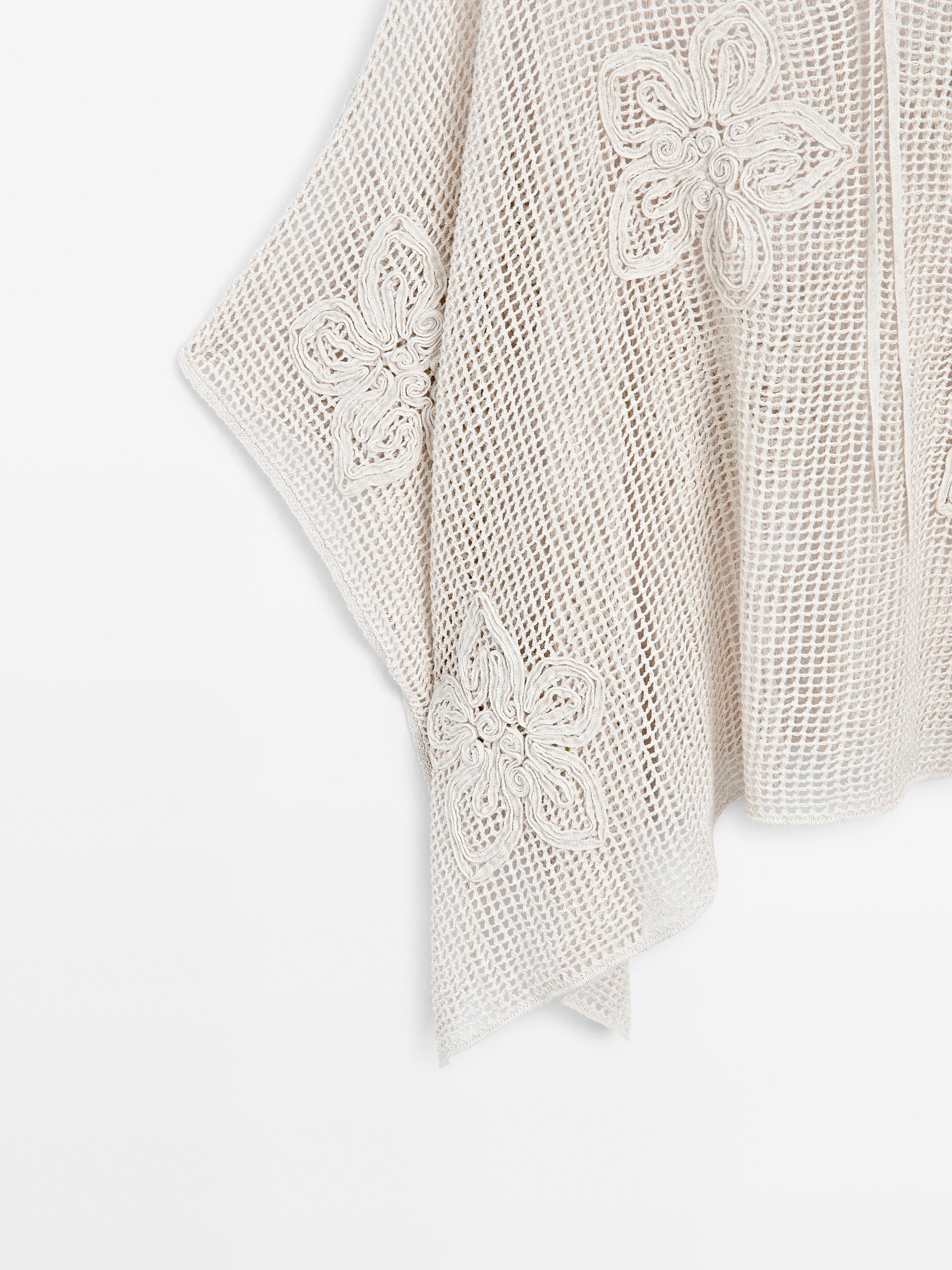 Embroidered cutwork cape