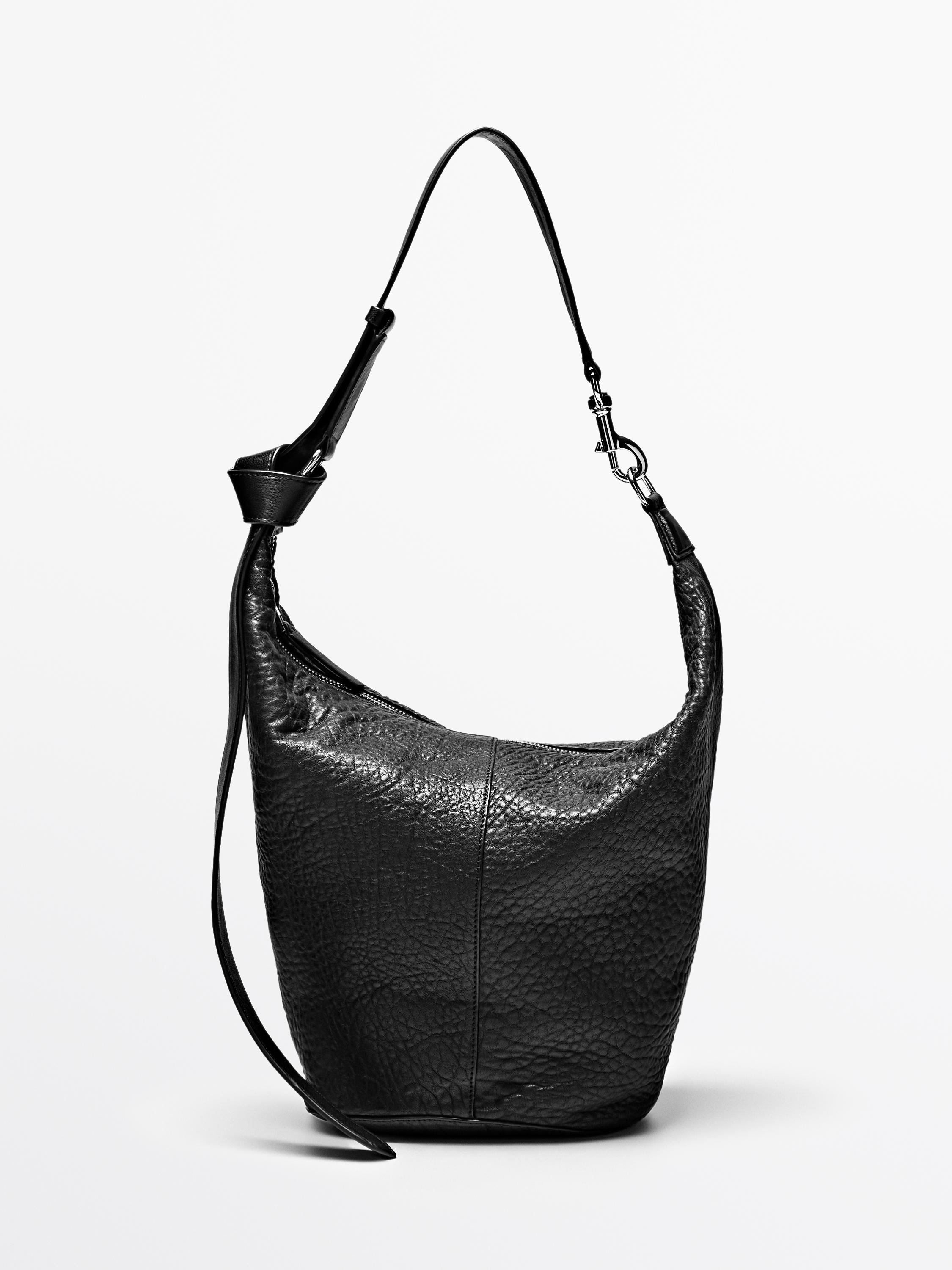 desmo bucket style leather backpack The List Made of smooth leather with a detachable shoulder strap Diesel Black Scrunch-D Bucket Bag