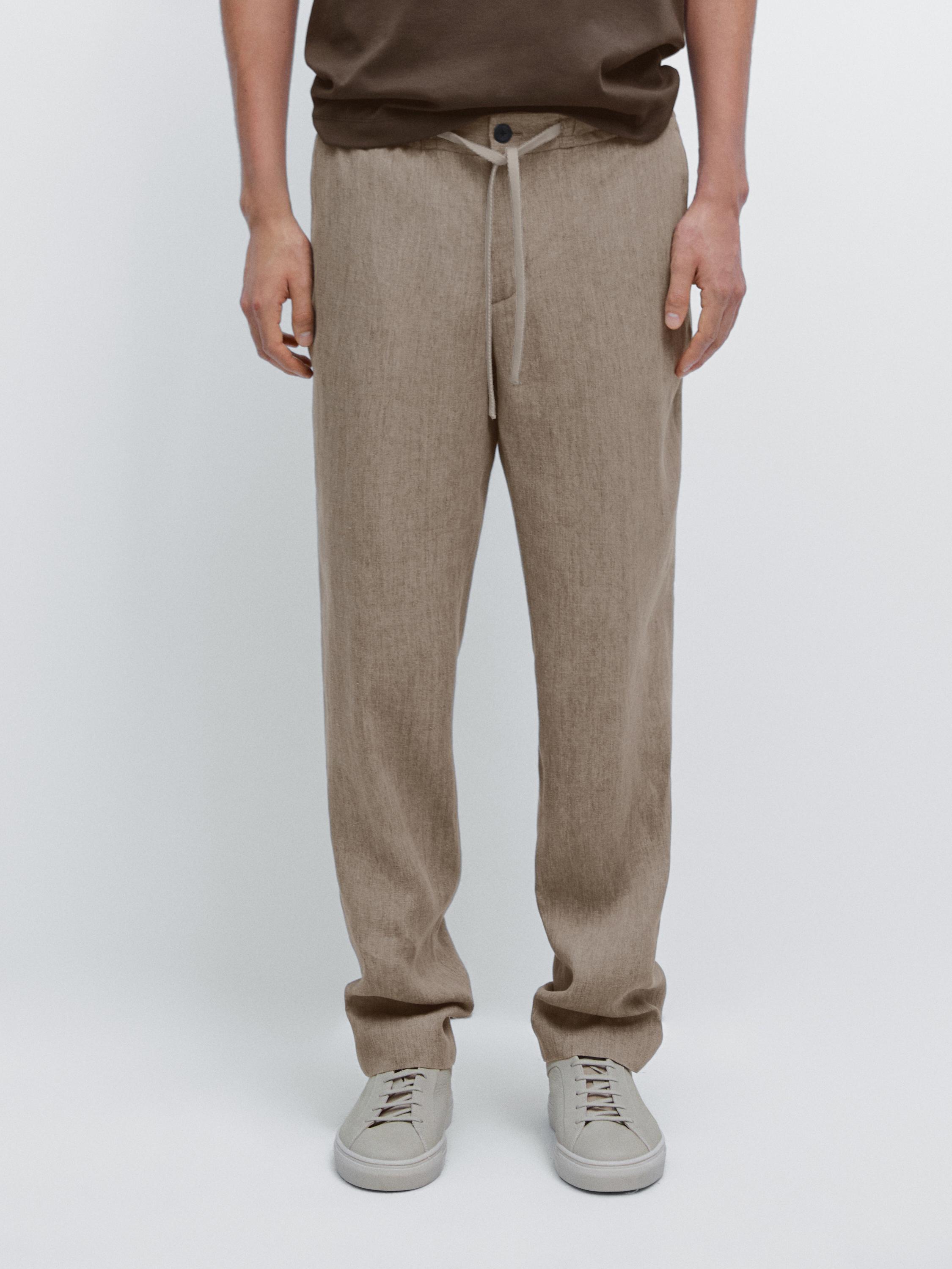 بنطلون كتان بلون باهت ضمن إطلالة كاملة