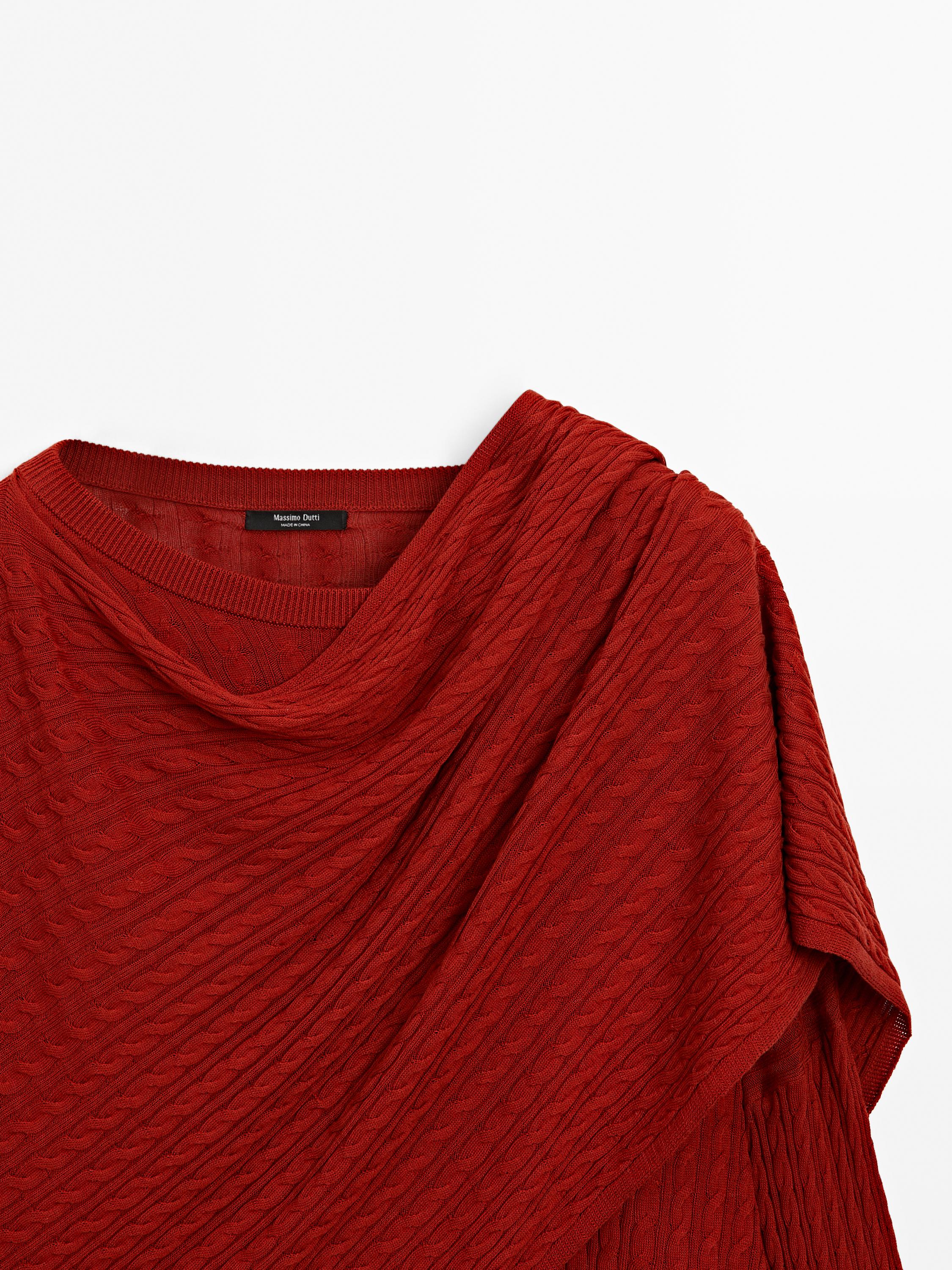 Cable-knit sweater with scarf detail