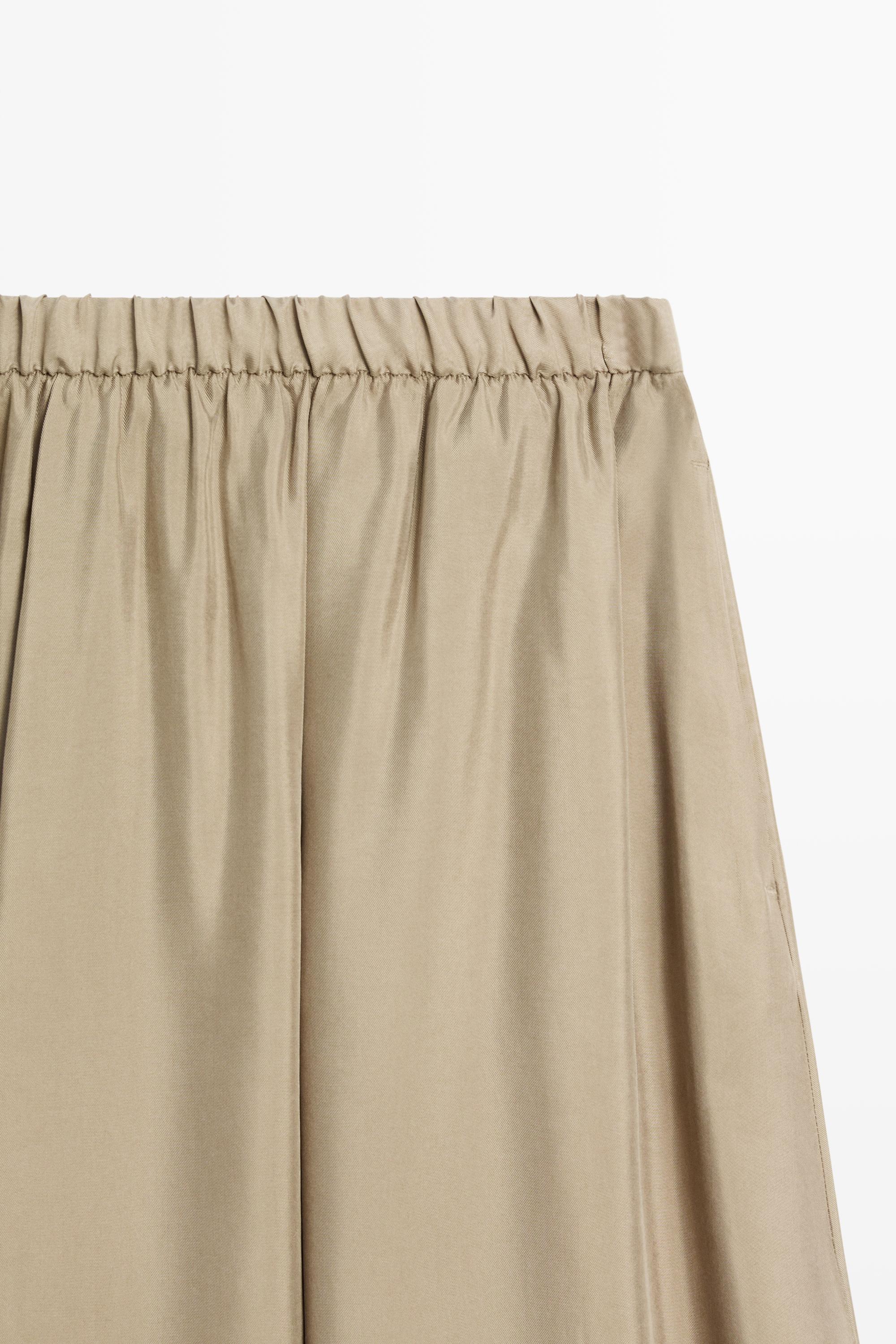 Flowing elastic waist midi skirt — SAND