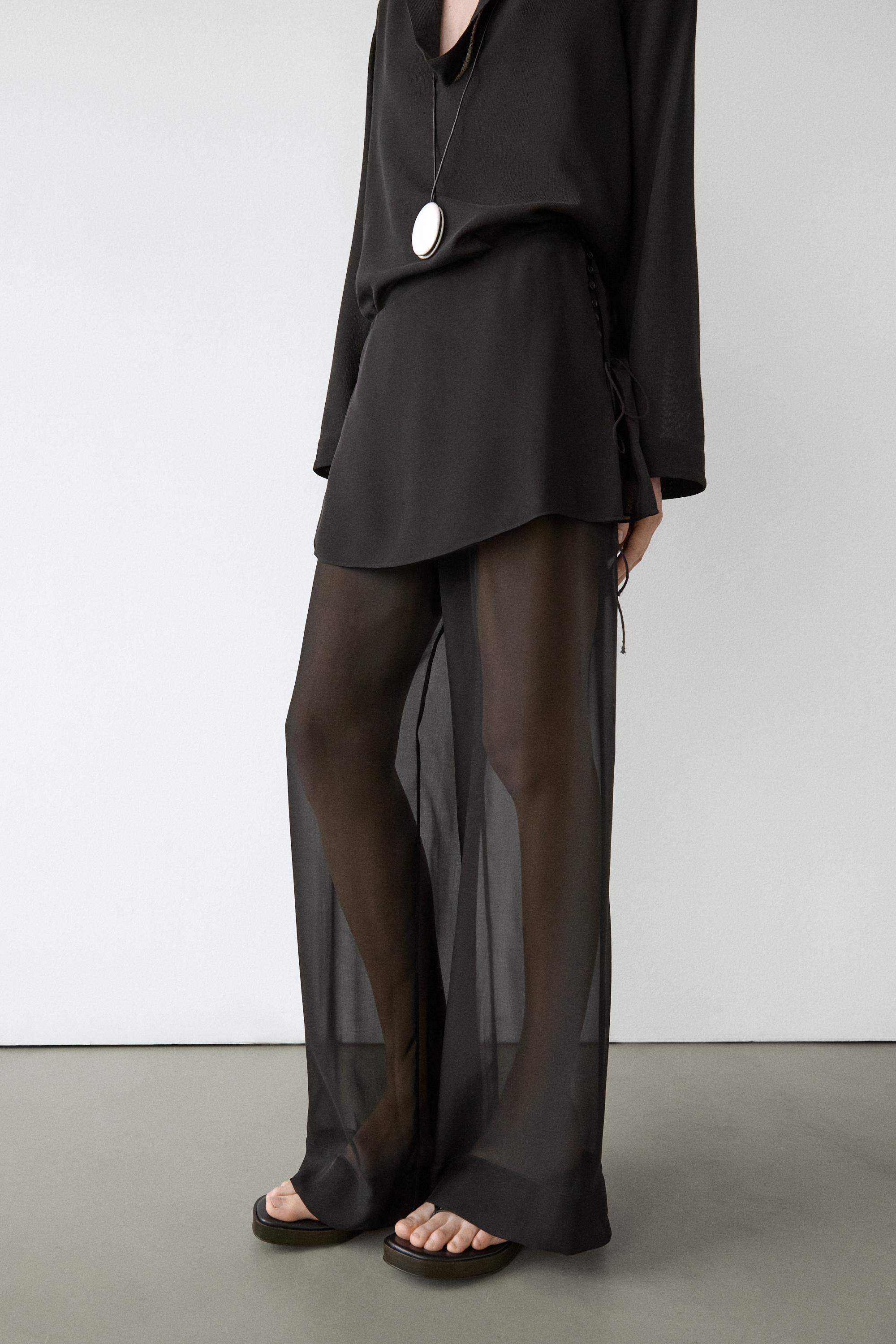 Luźne kontrastowe spodnie z jedwabiu