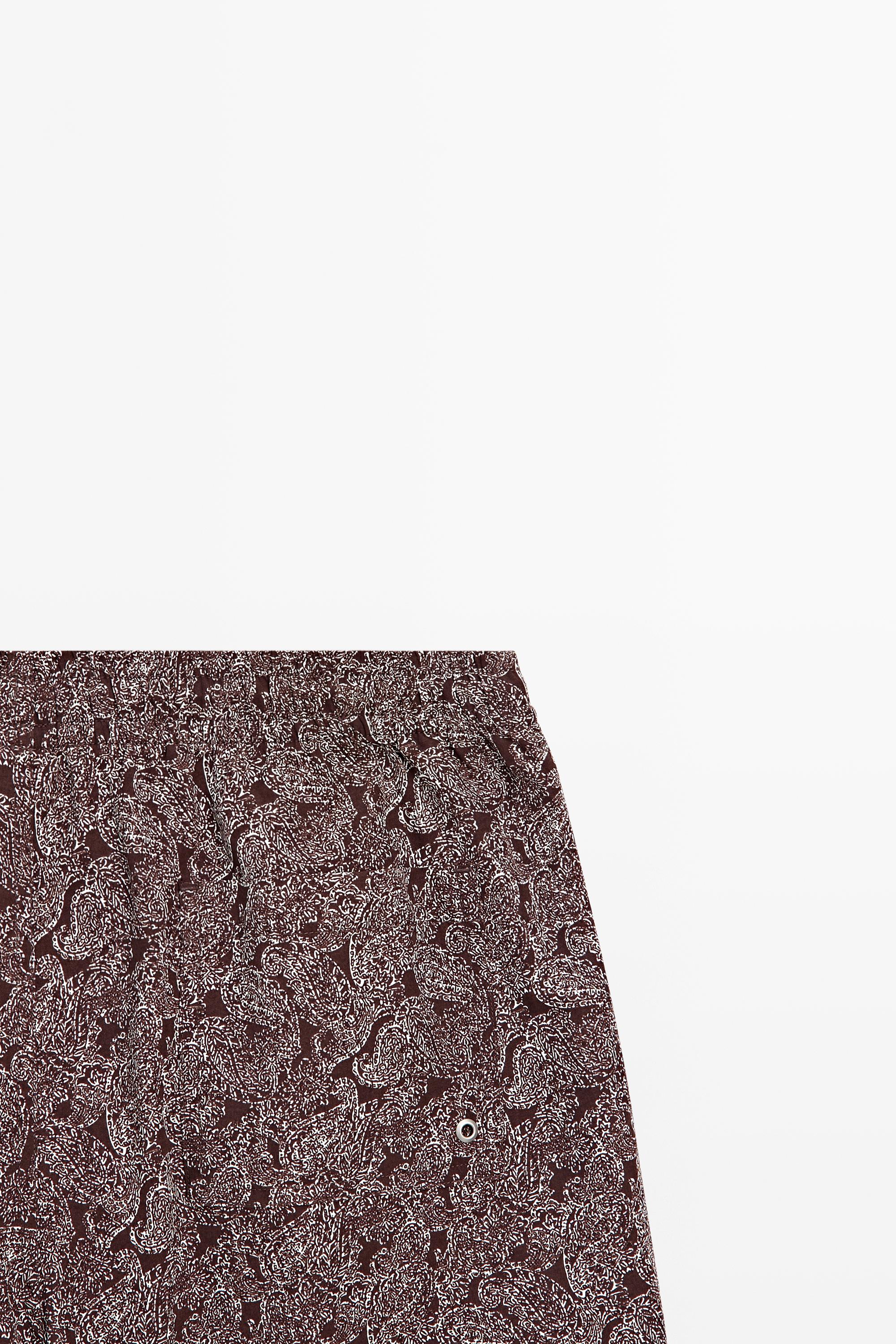 Paisley print swimming trunks — RUSSET