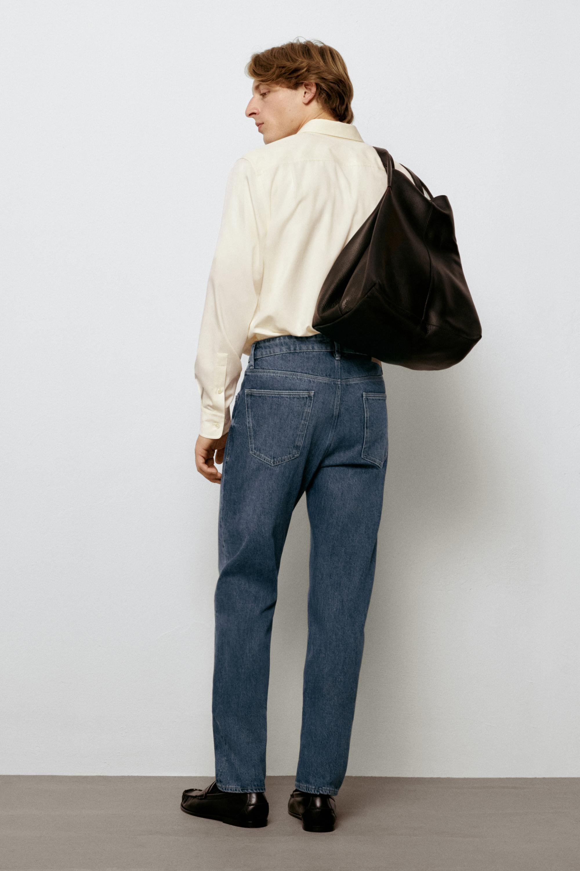 Enzymatic tapered fit jeans — INDIGO