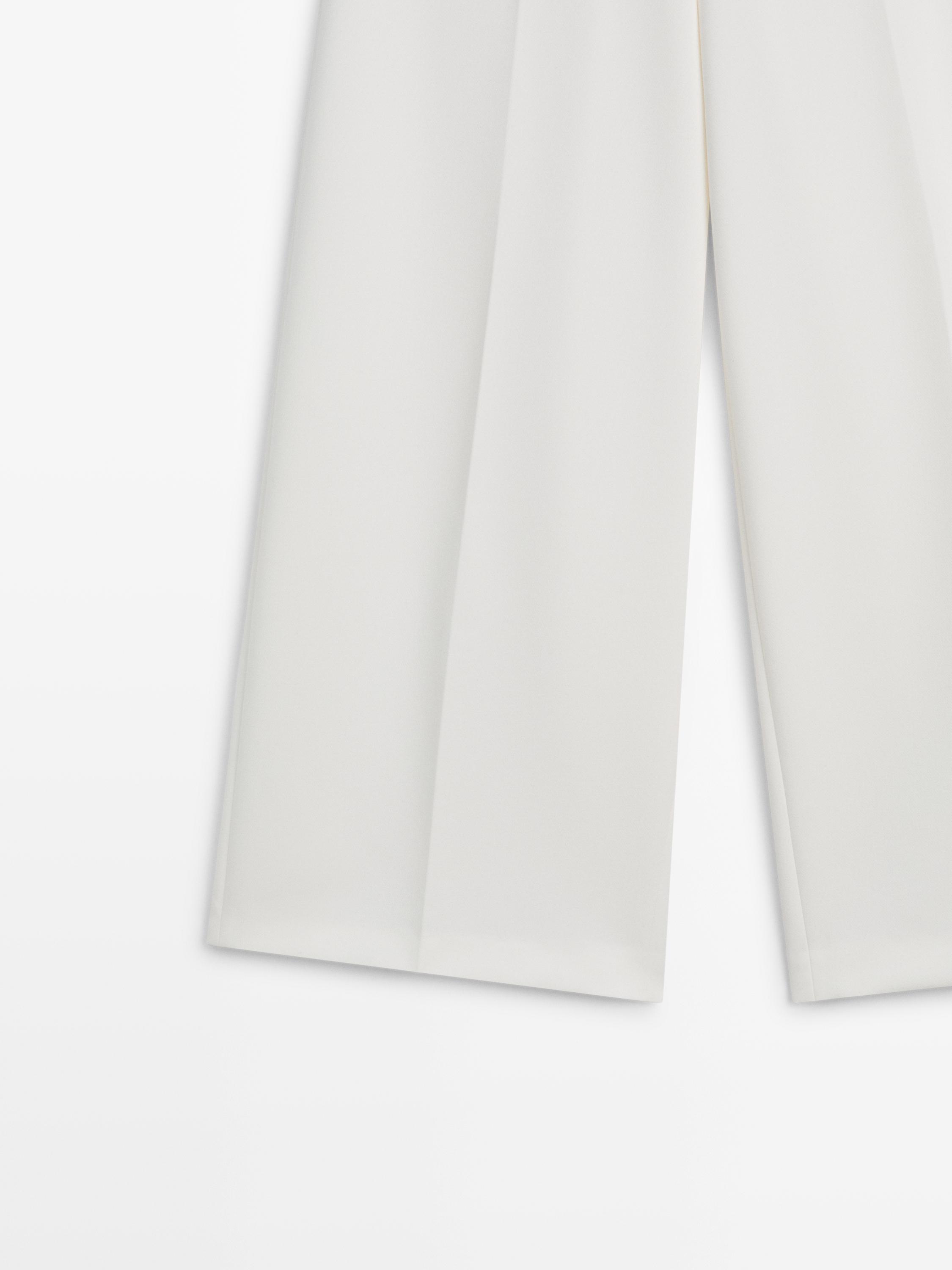 Wide-leg voluminous trousers — CREAM