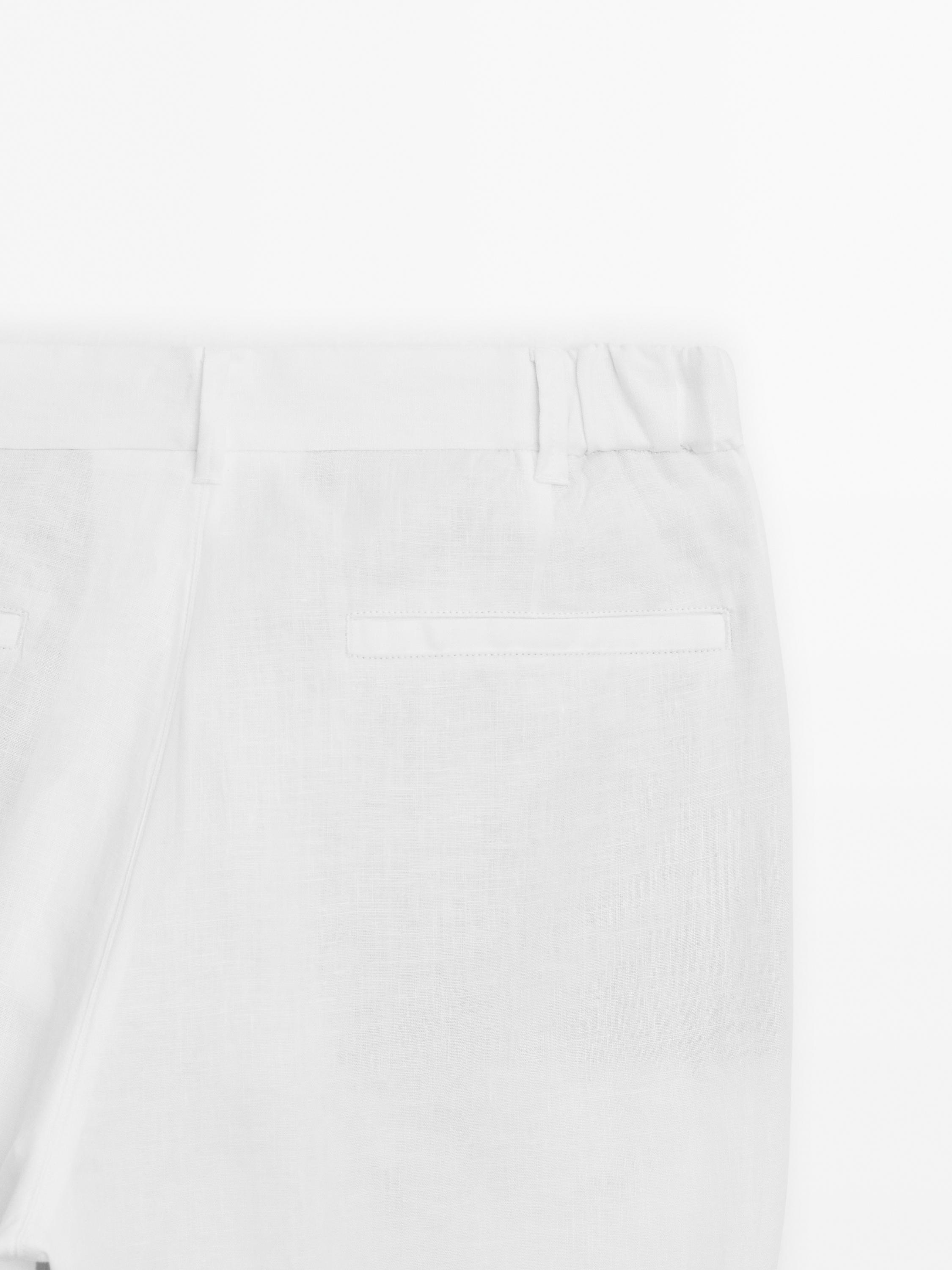 Pantalón tapered fit 100% lino