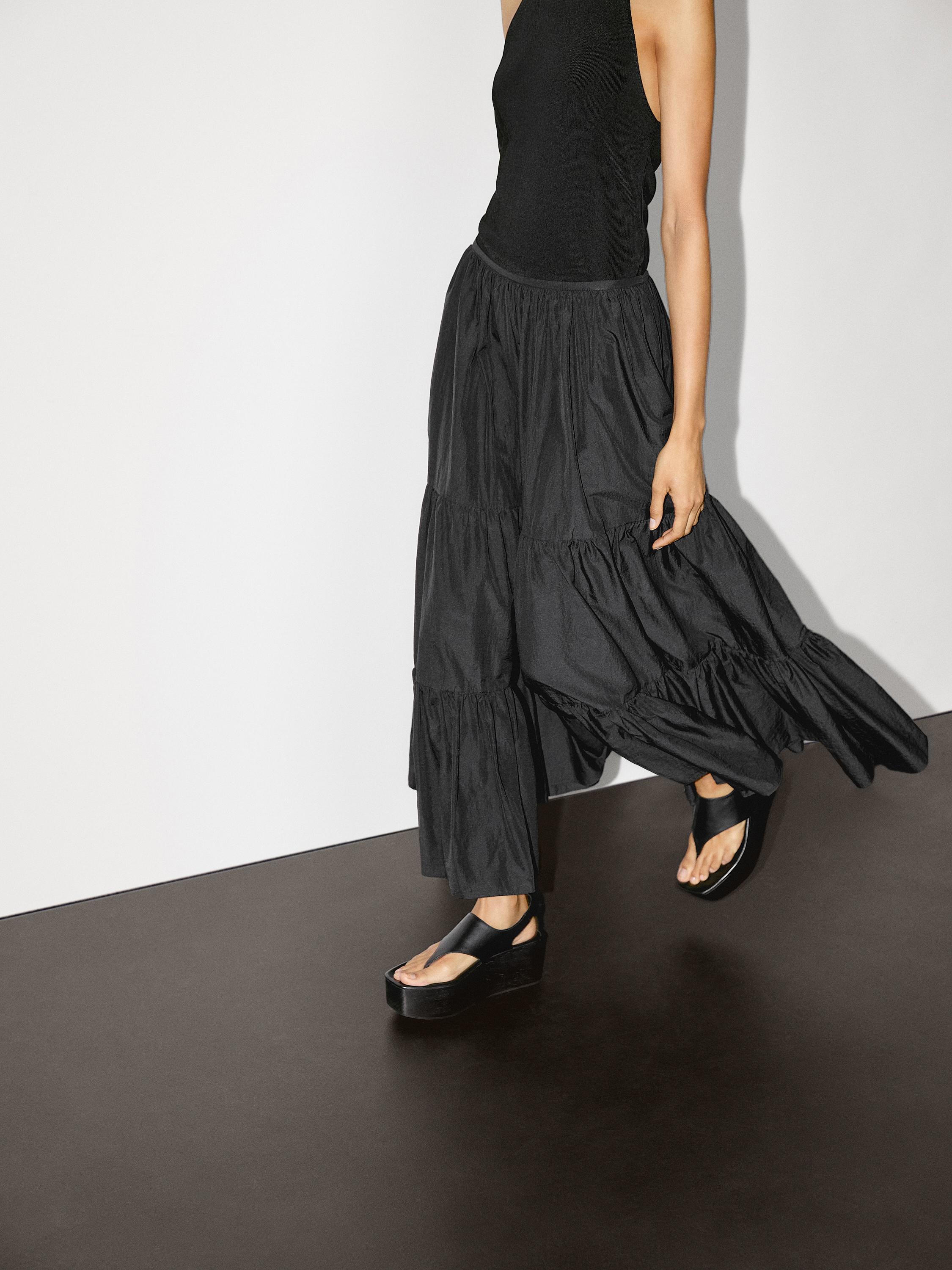 Falda larga evasé detalle frunces