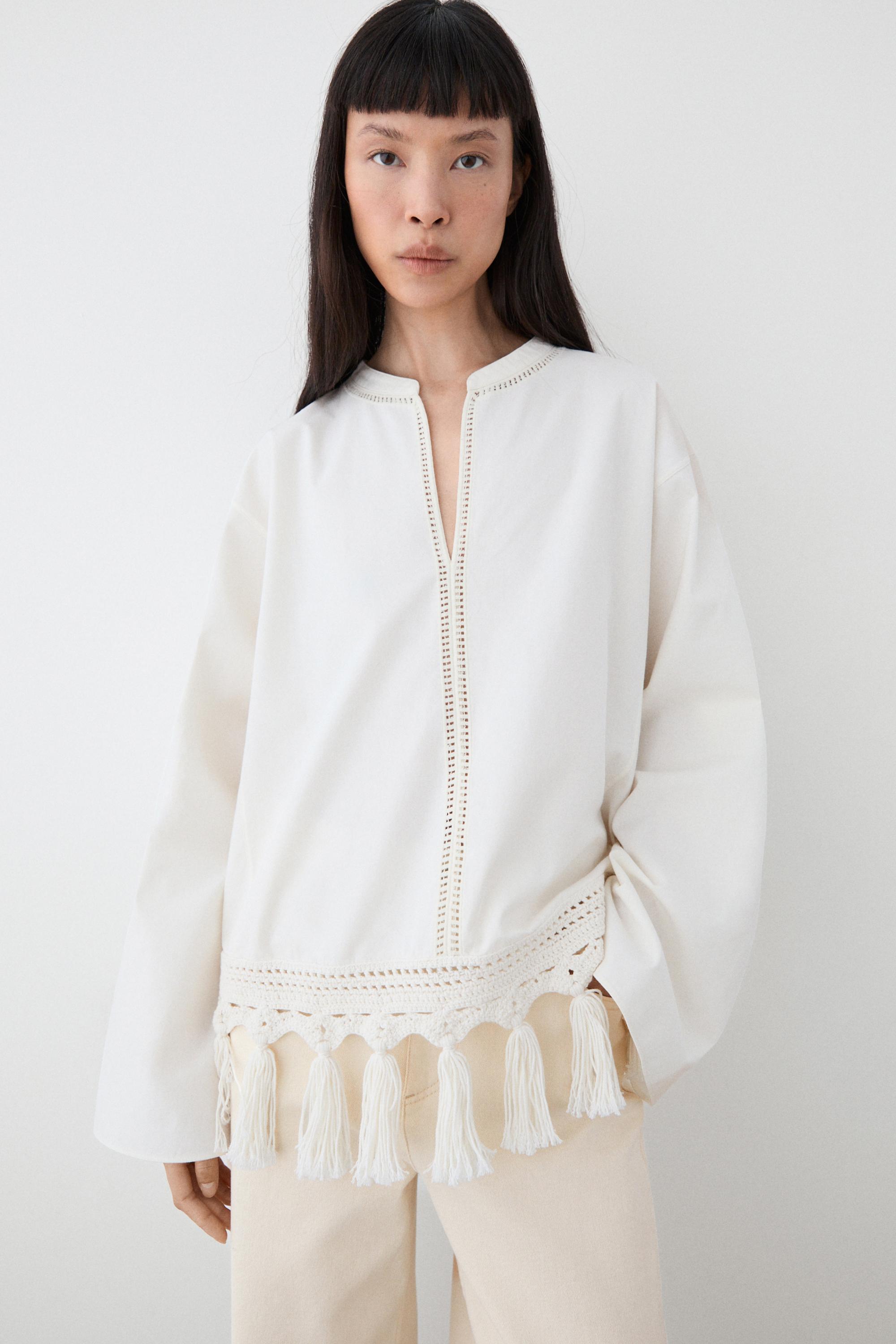 Embroidered blouse with fringed hem — WHITE