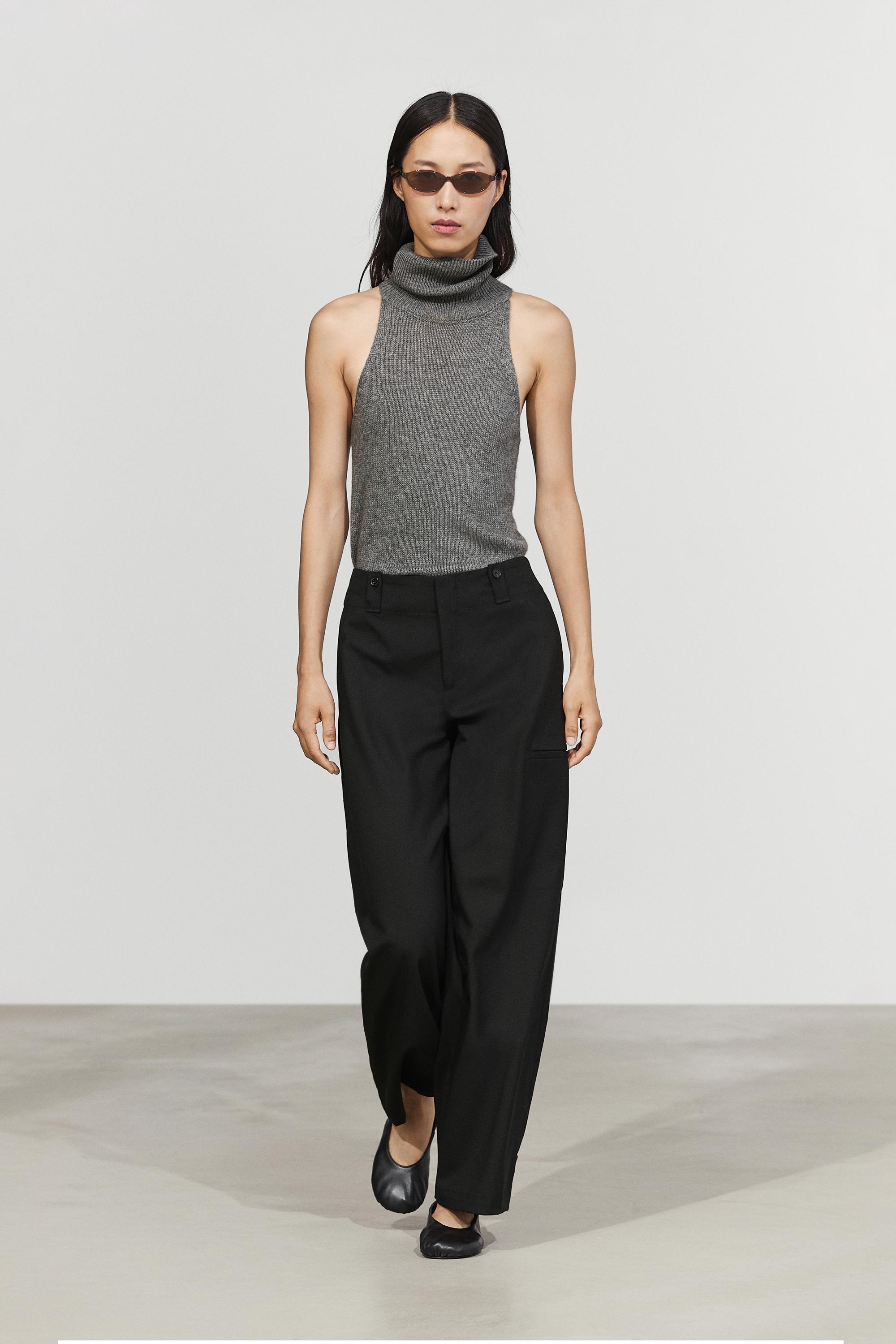 Cargo pants with hem button detail
