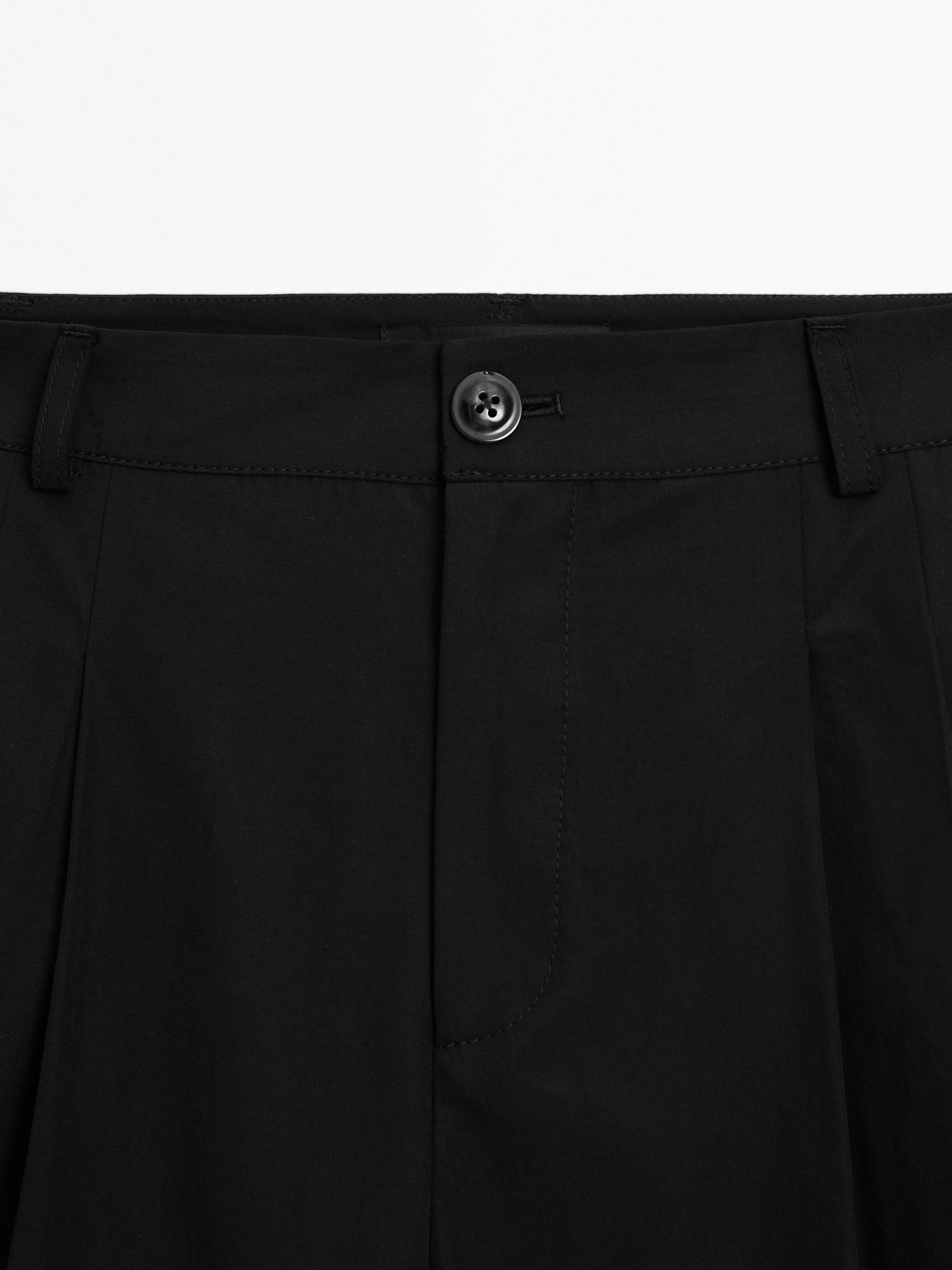 Wide-leg cotton blend trousers