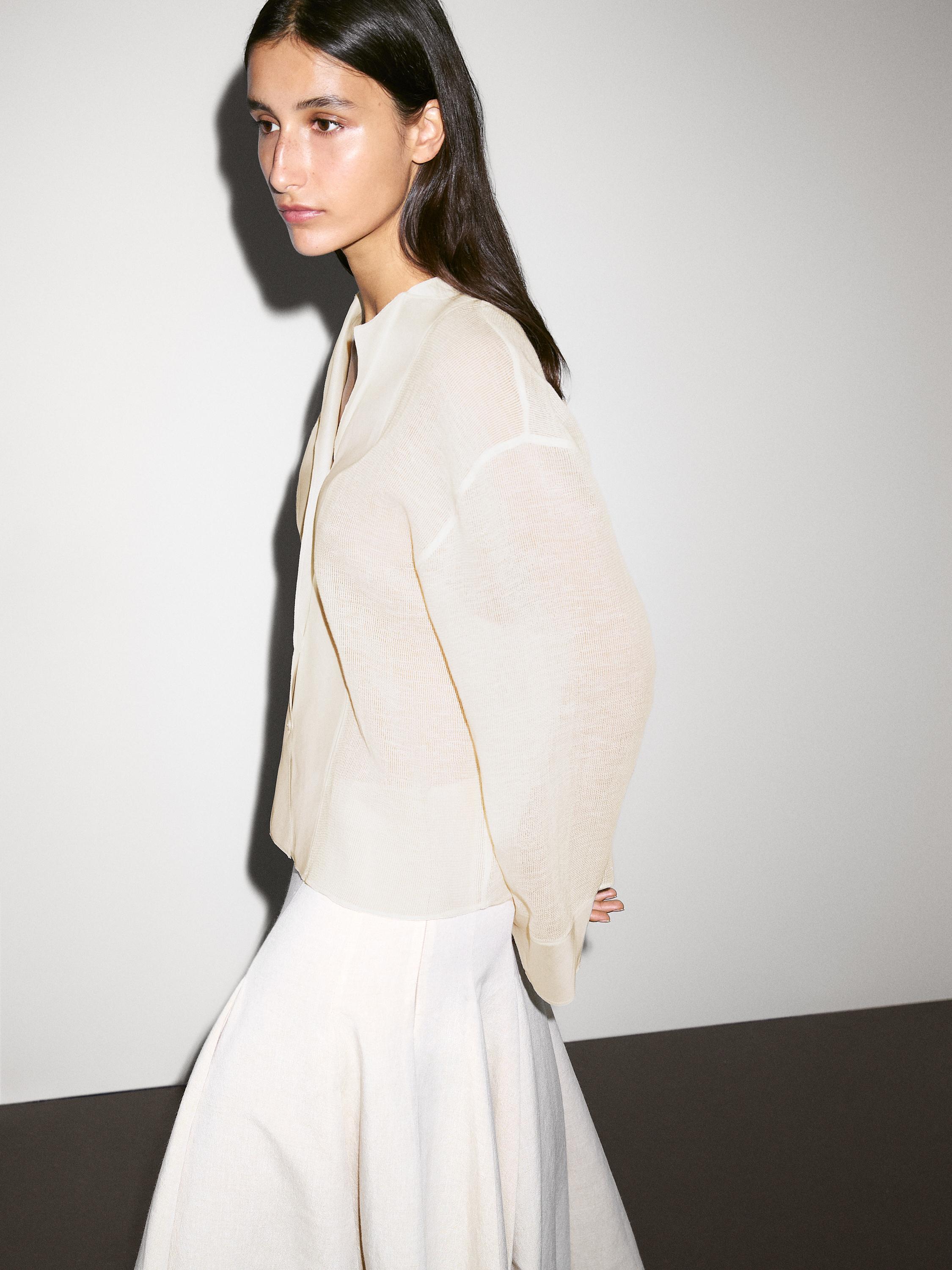 Cotton blend blouse with fabric detail