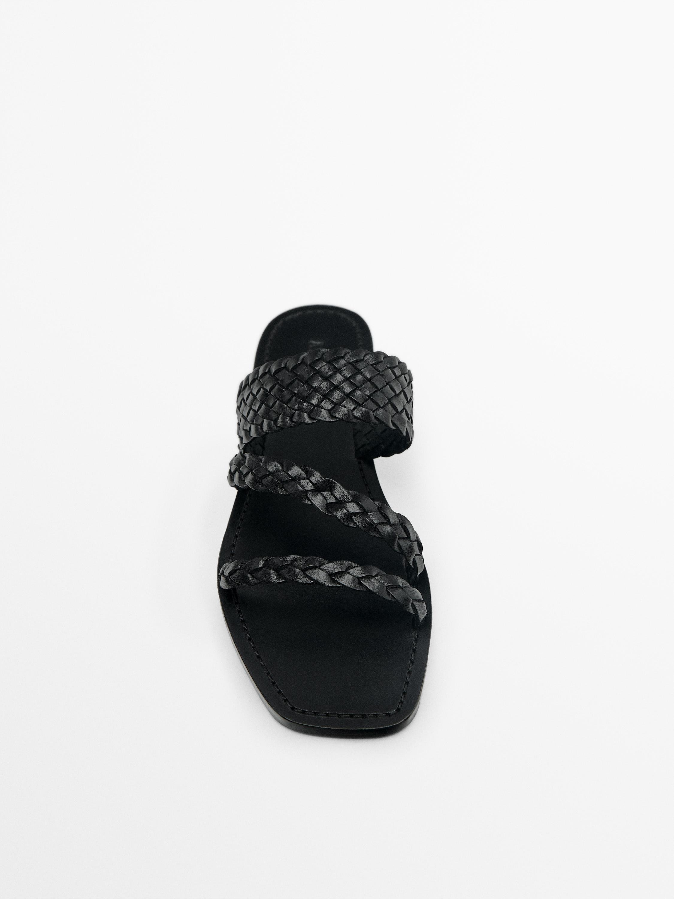 Flat slider sandals with woven straps