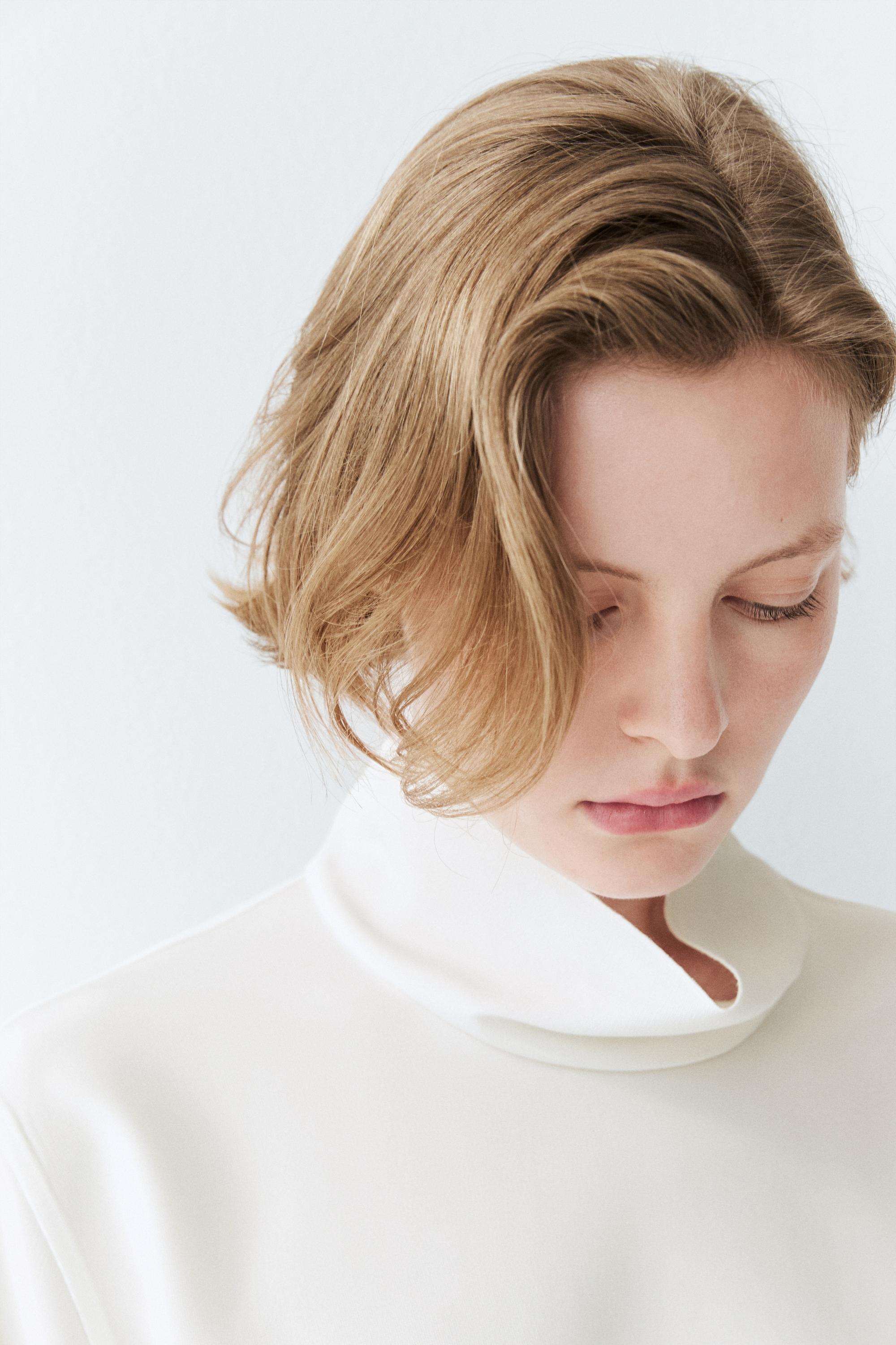 High neck blouse with hem detail — WHITE