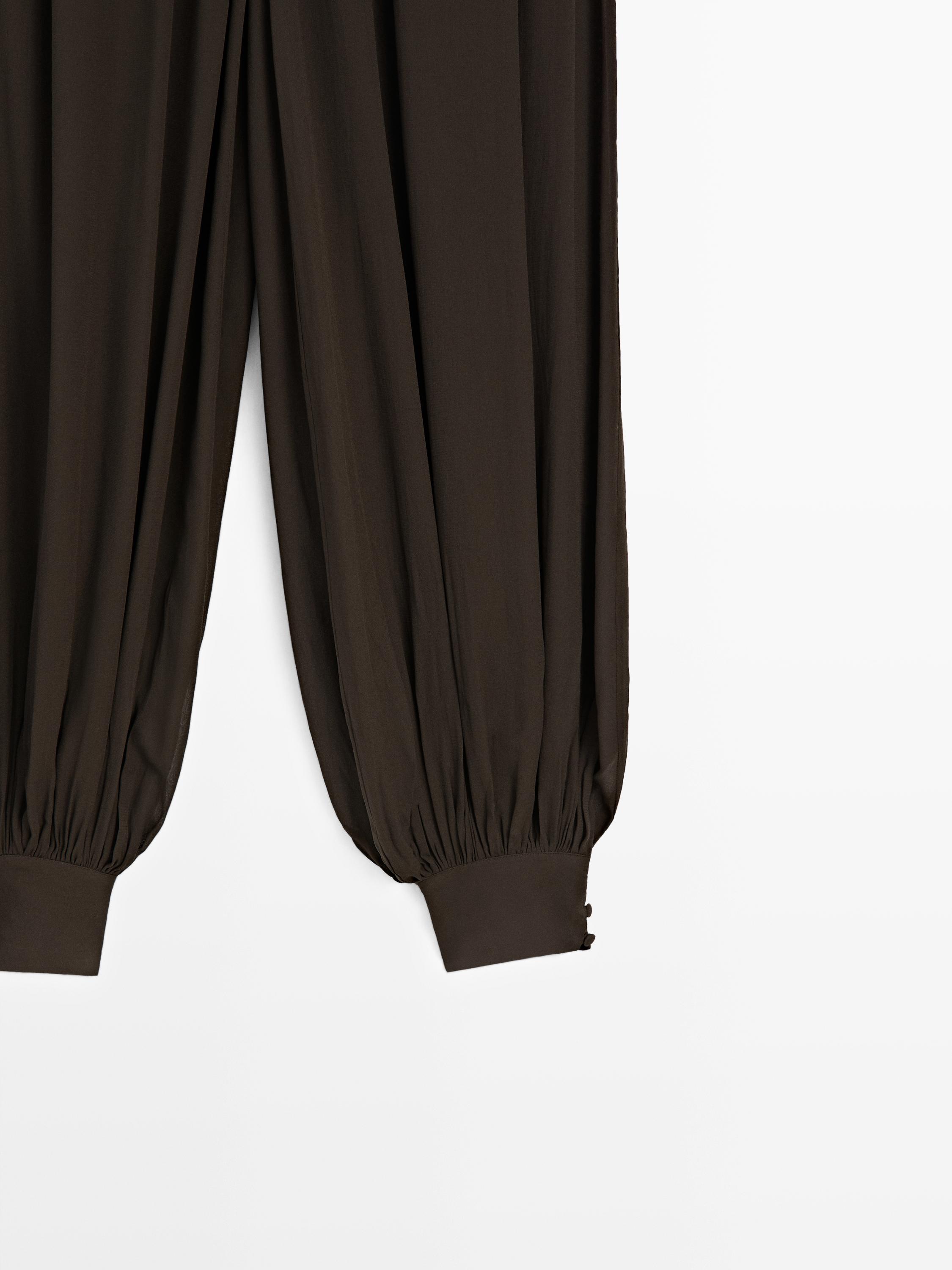 Semi-sheer sarouel trousers with button details — Chocolate