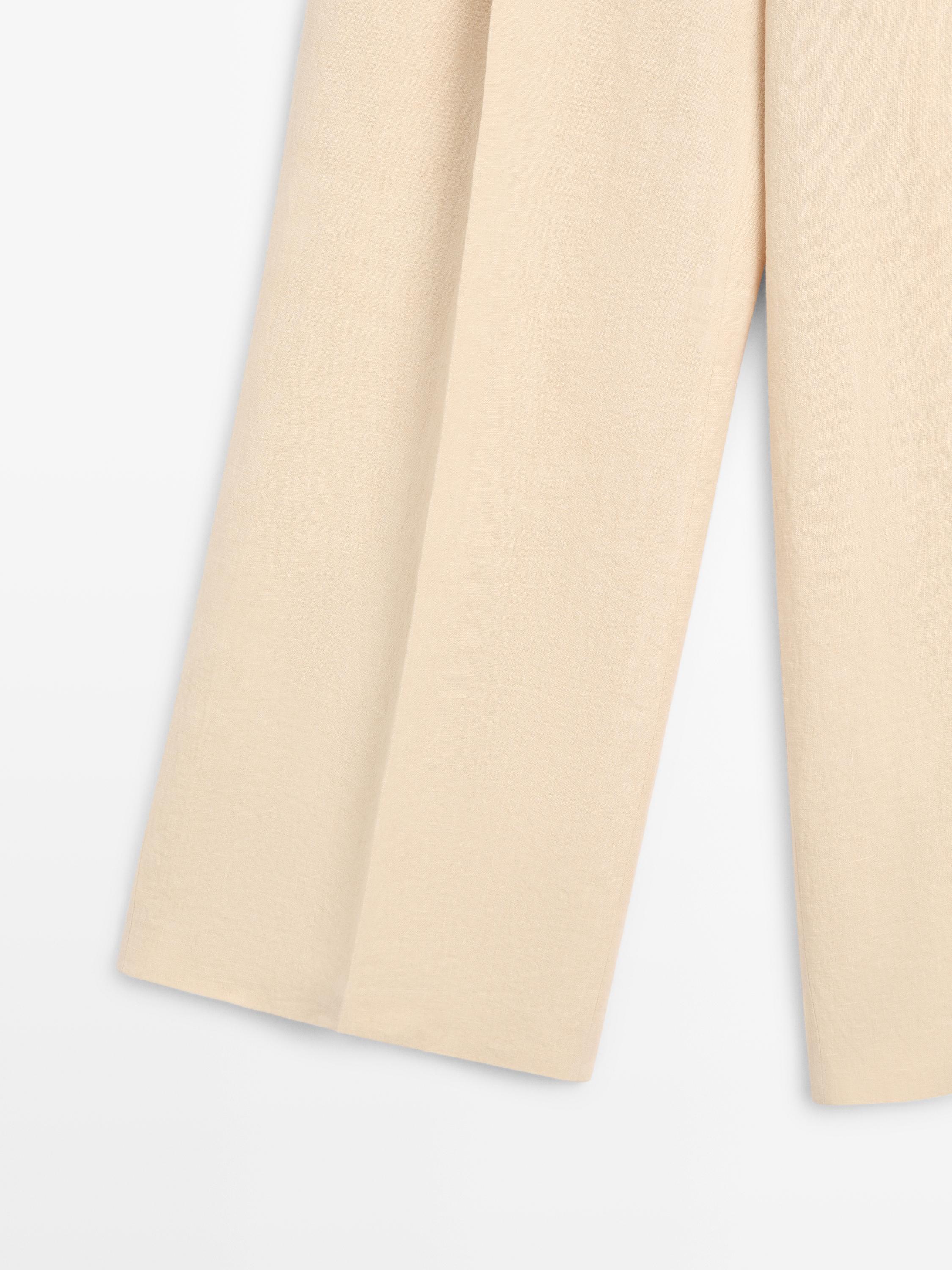 Wide-leg linen trousers with pocket detail — SAND