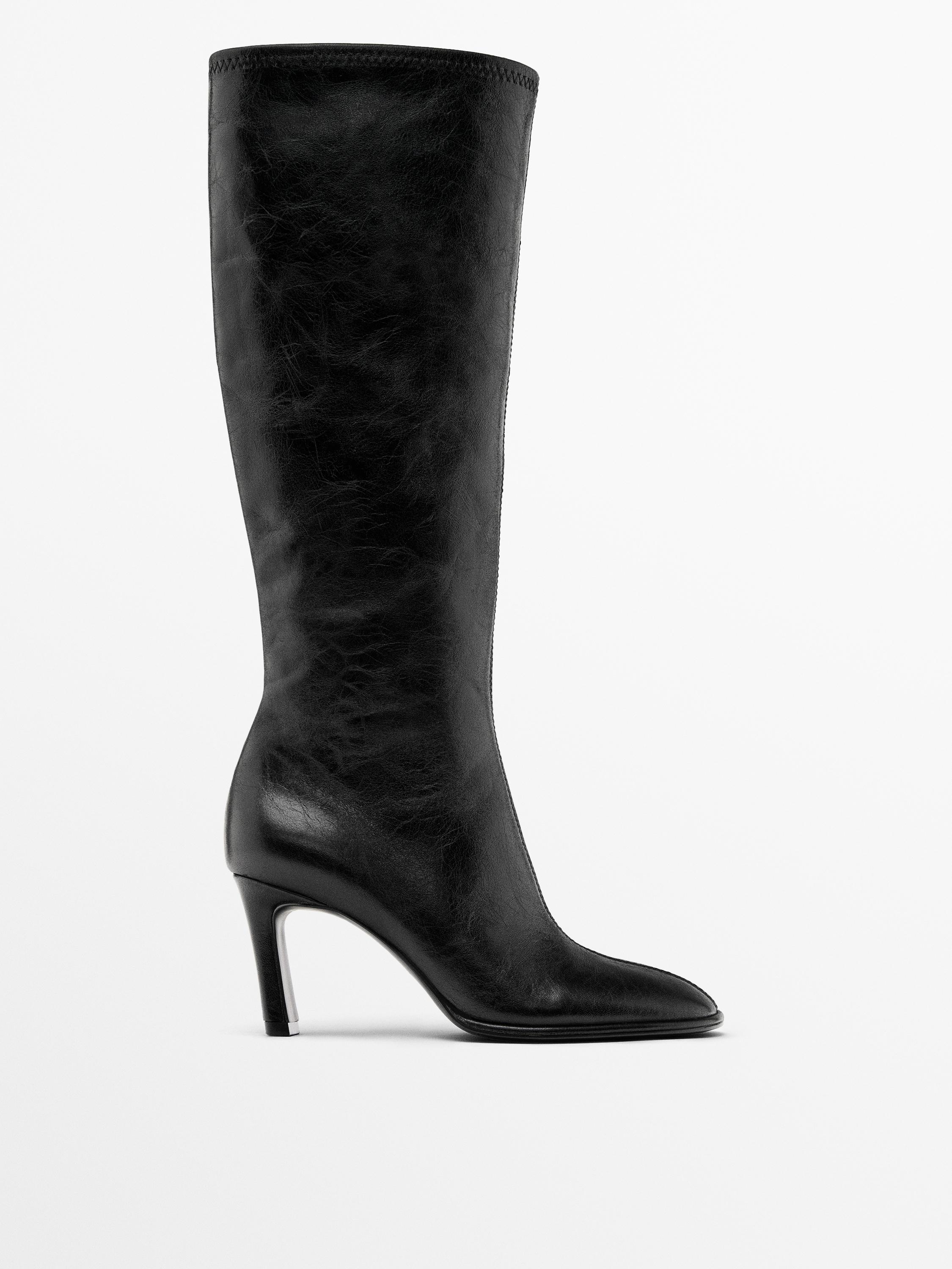 High-heel boots with elastic gores on the leg