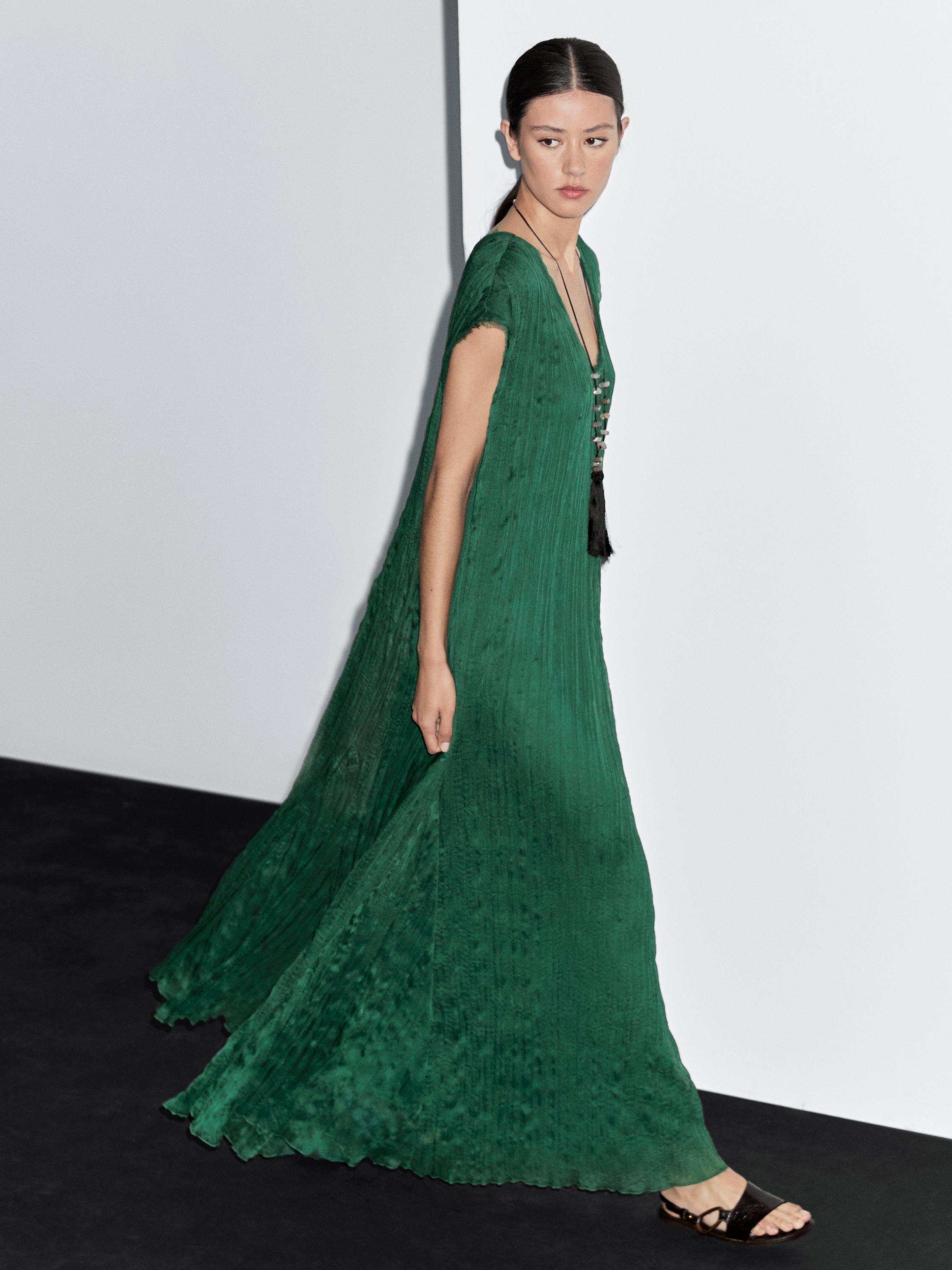 Long pleated V-neck dress