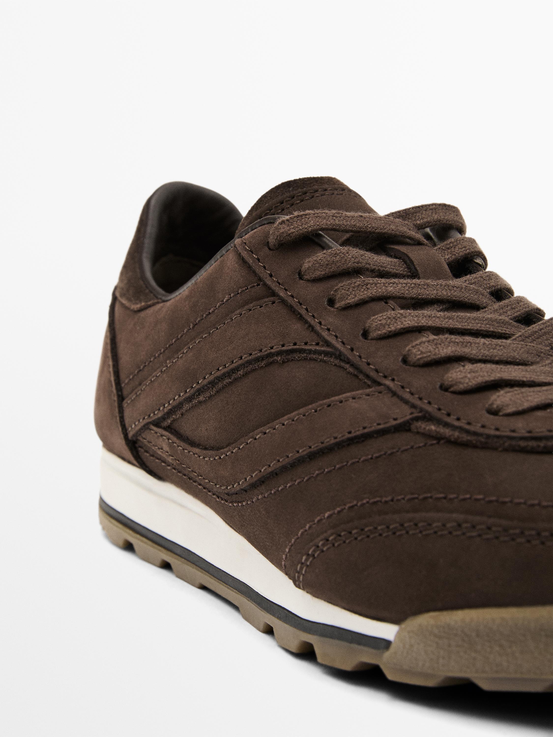 Sneakers in pelle a tinta unita