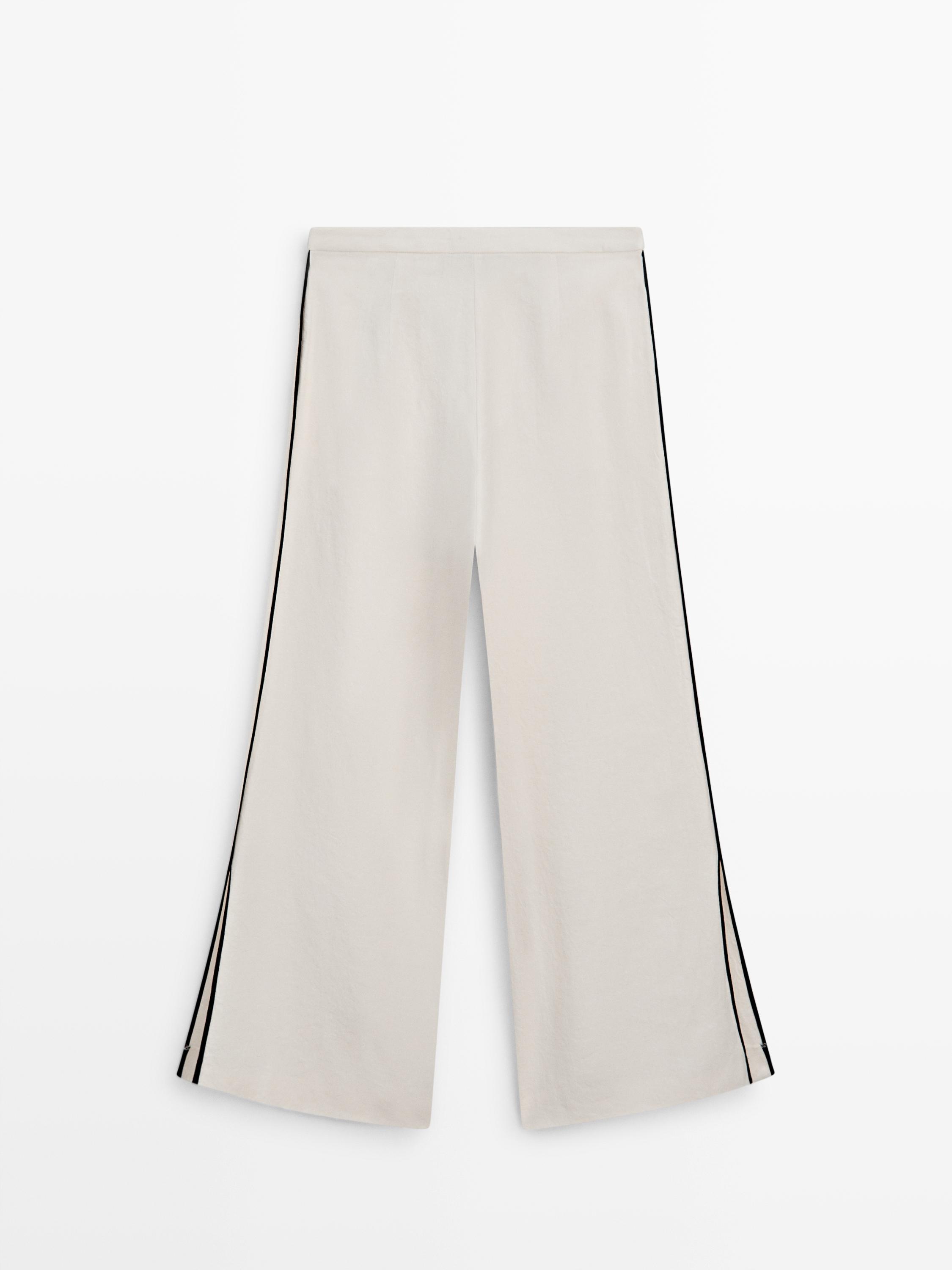 Linen trousers with contrast piping — CREAM