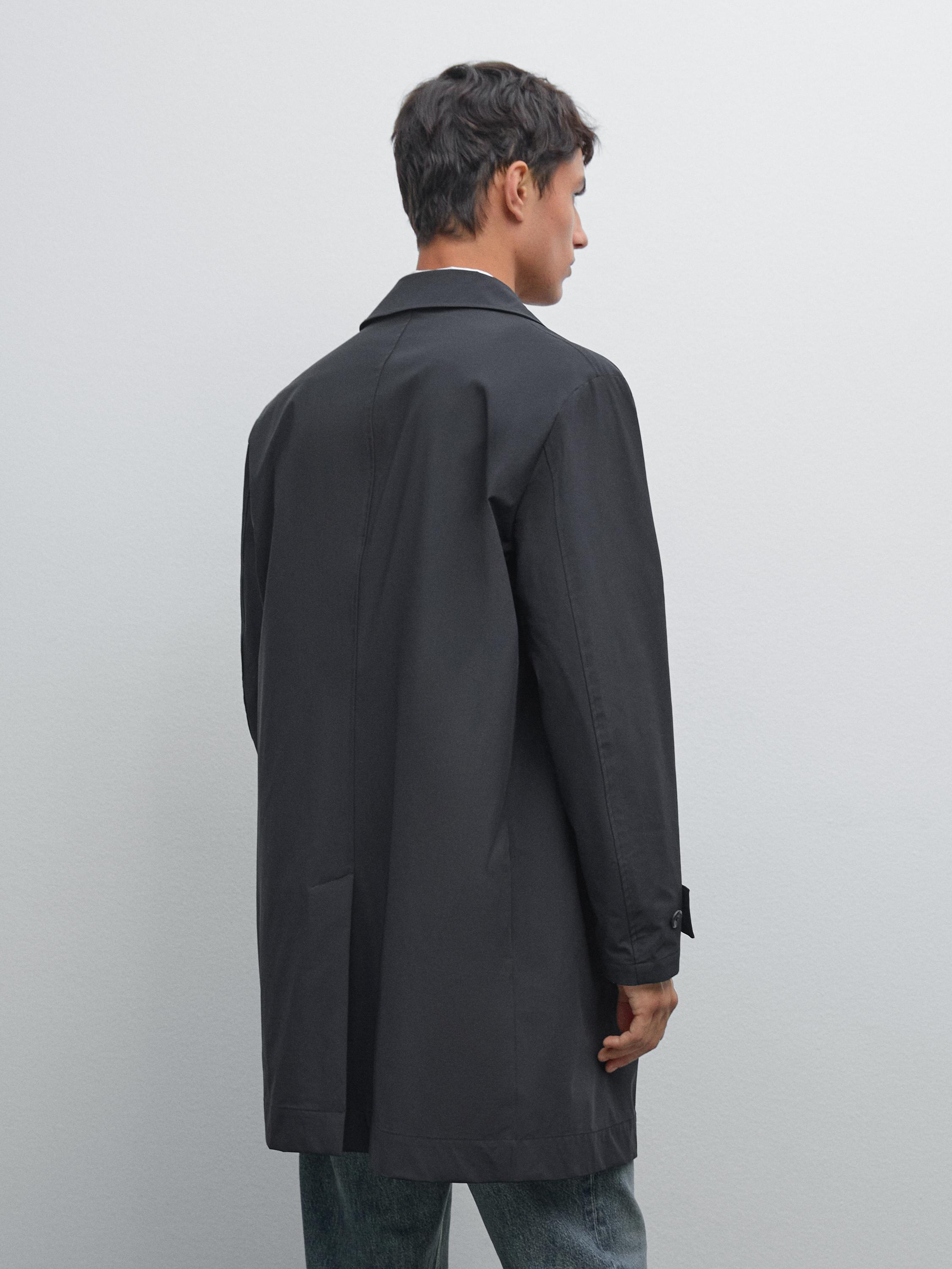 Lightweight trench coat with hidden buttons