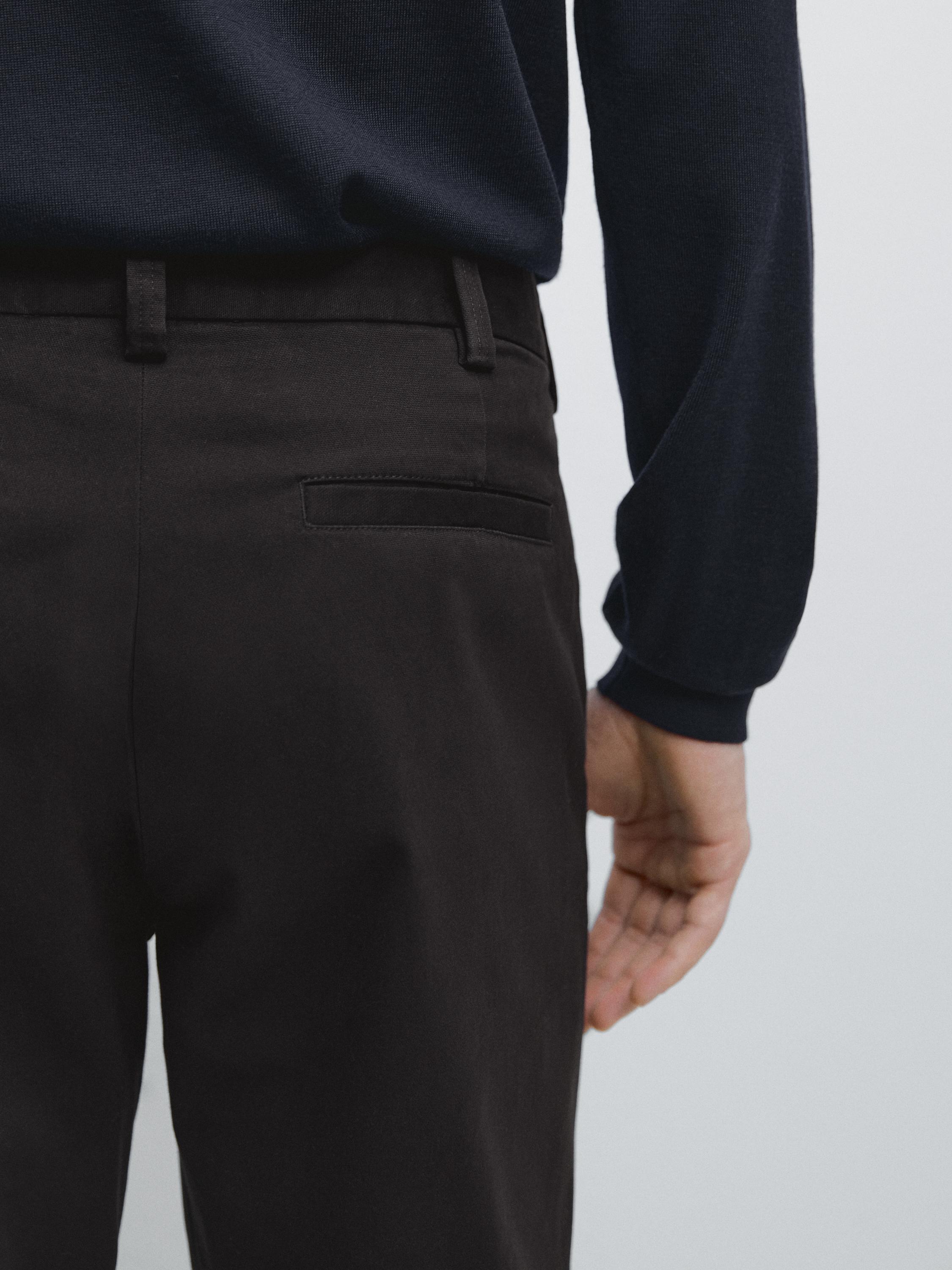 Tapered fit micro textured trousers — NAVY BLUE