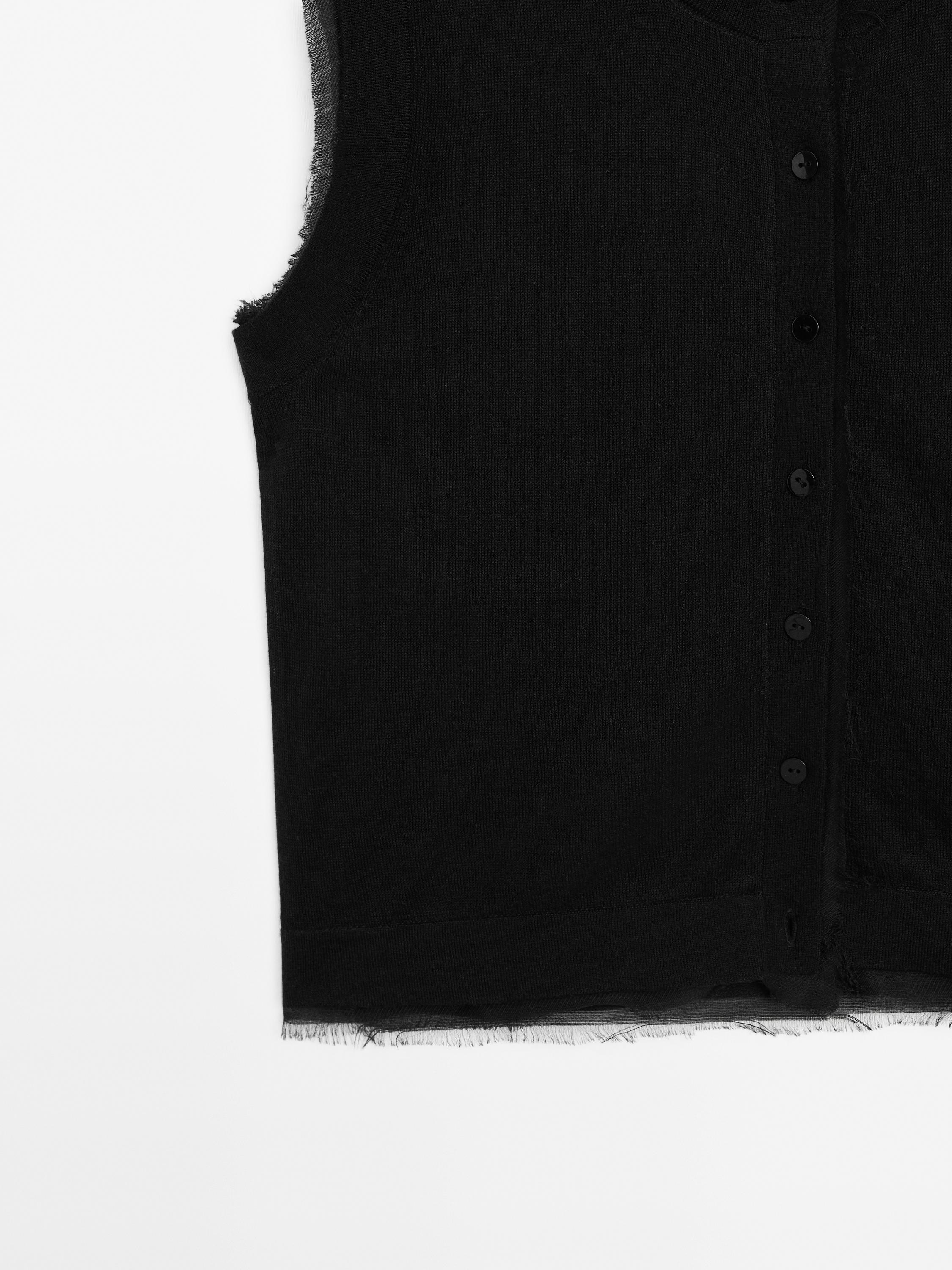 Chaleco detalle doble tejido