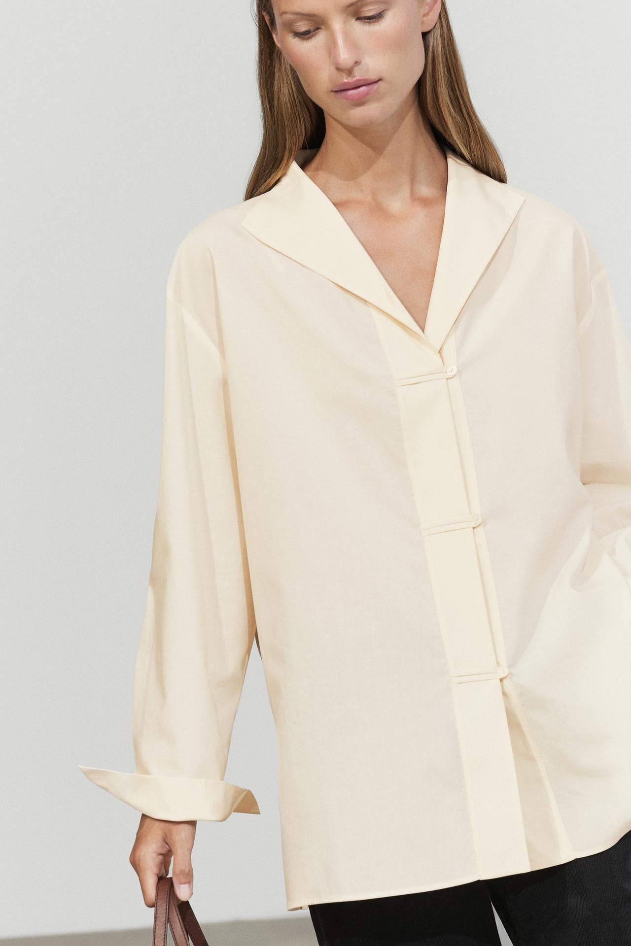 Flowing shirt with button details — CREAM