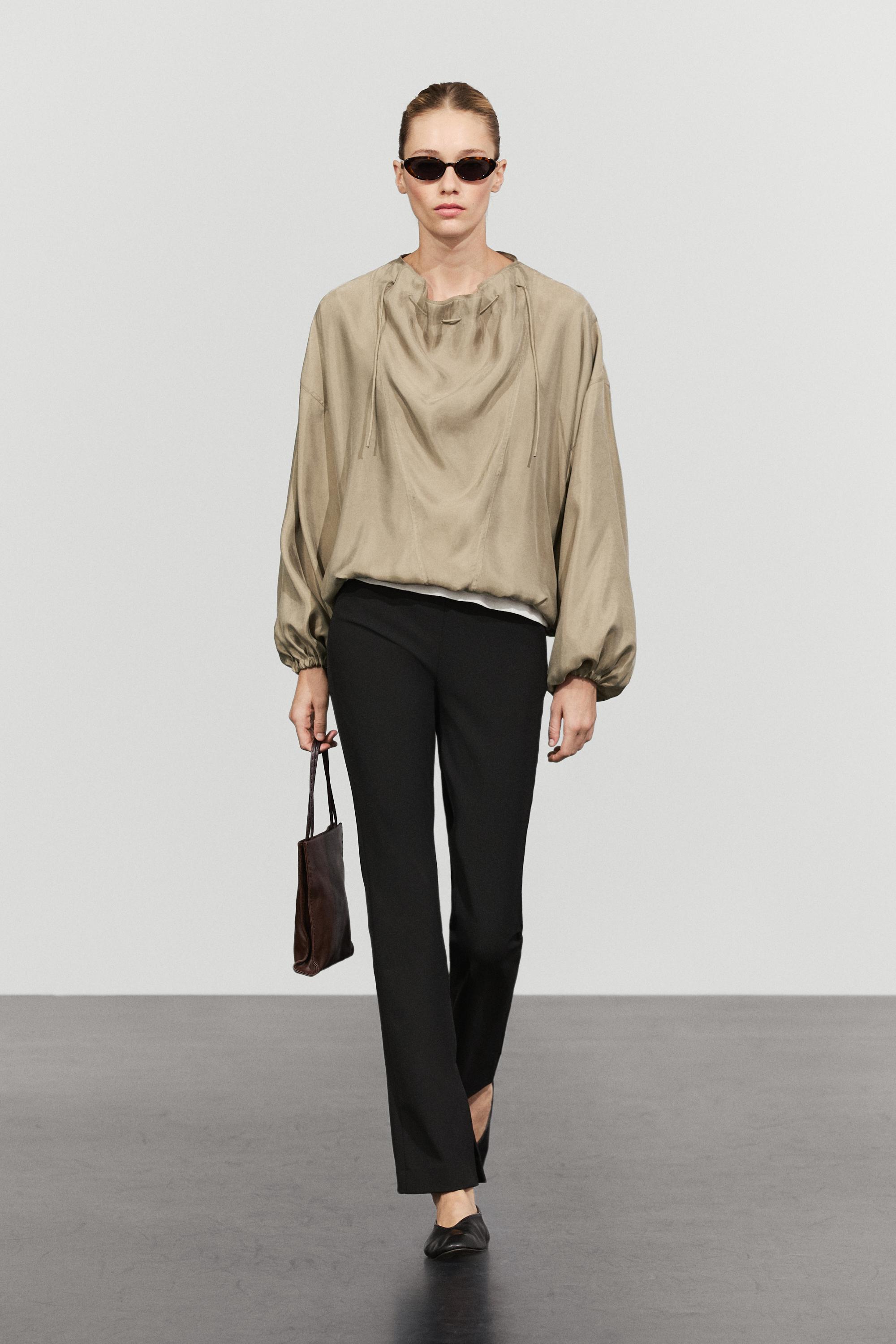 Flowing blouse with drawstring neck detail