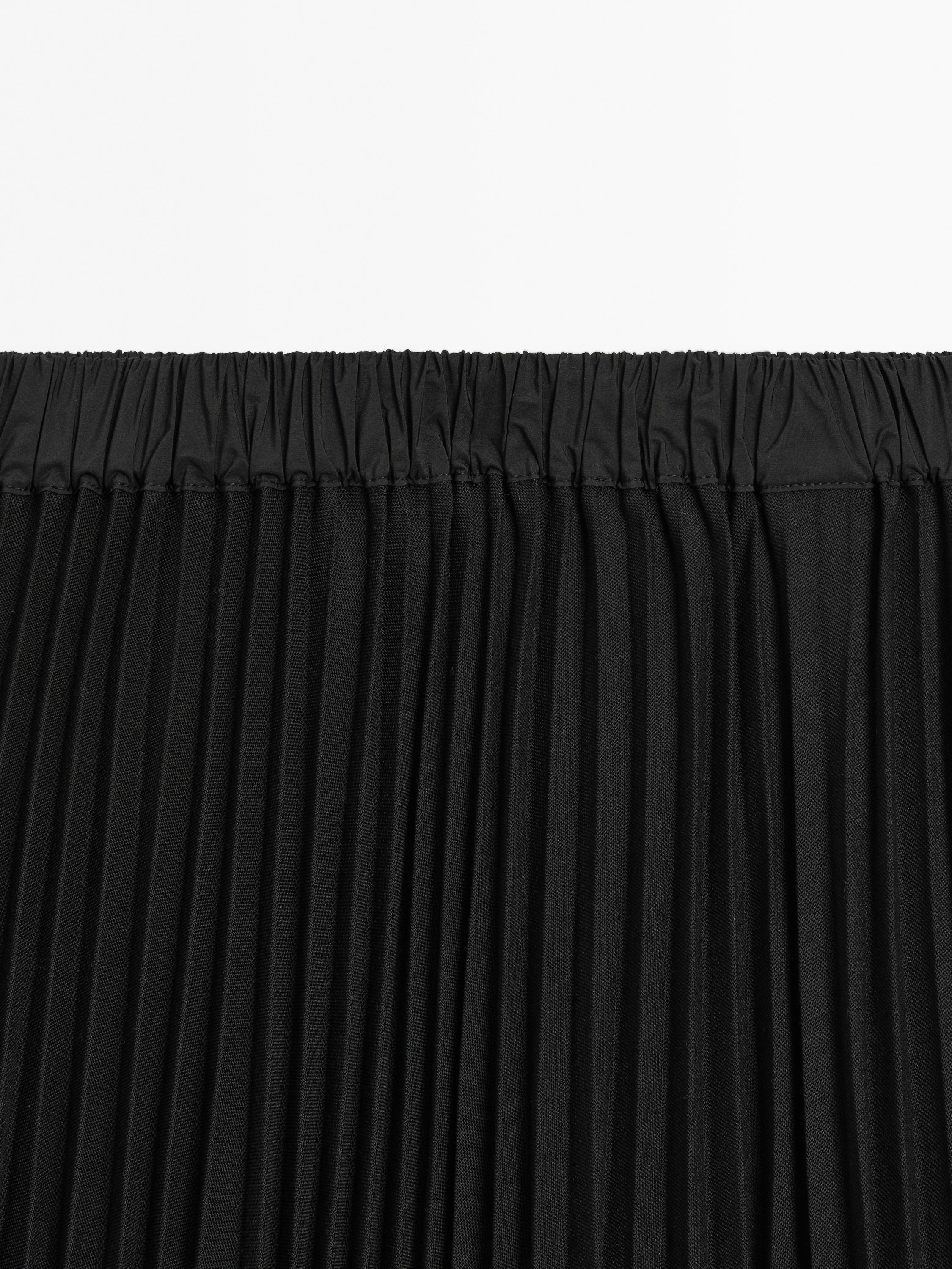 Flowing pleated midi skirt