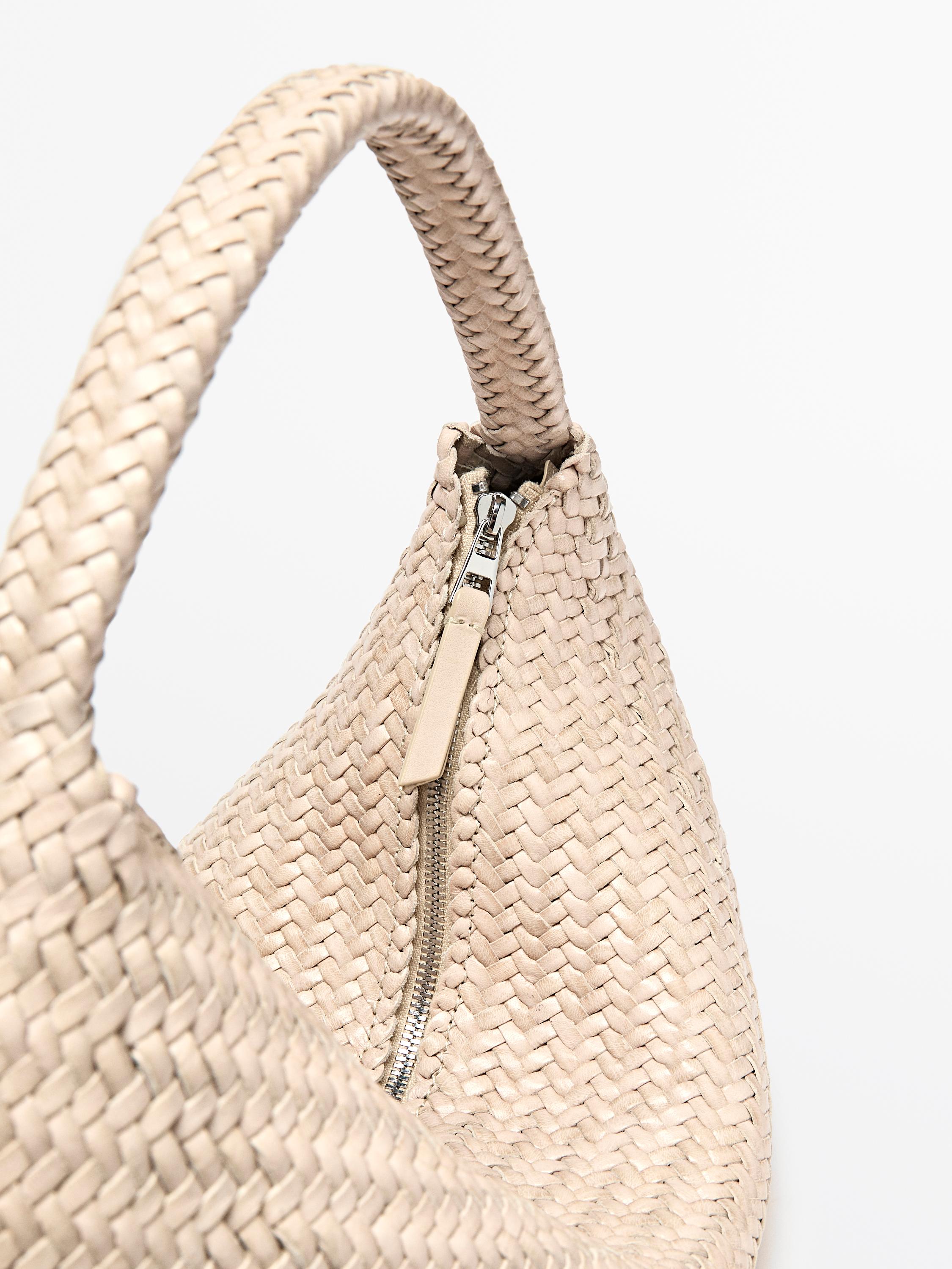 Braided leather half-moon bag — CREAM