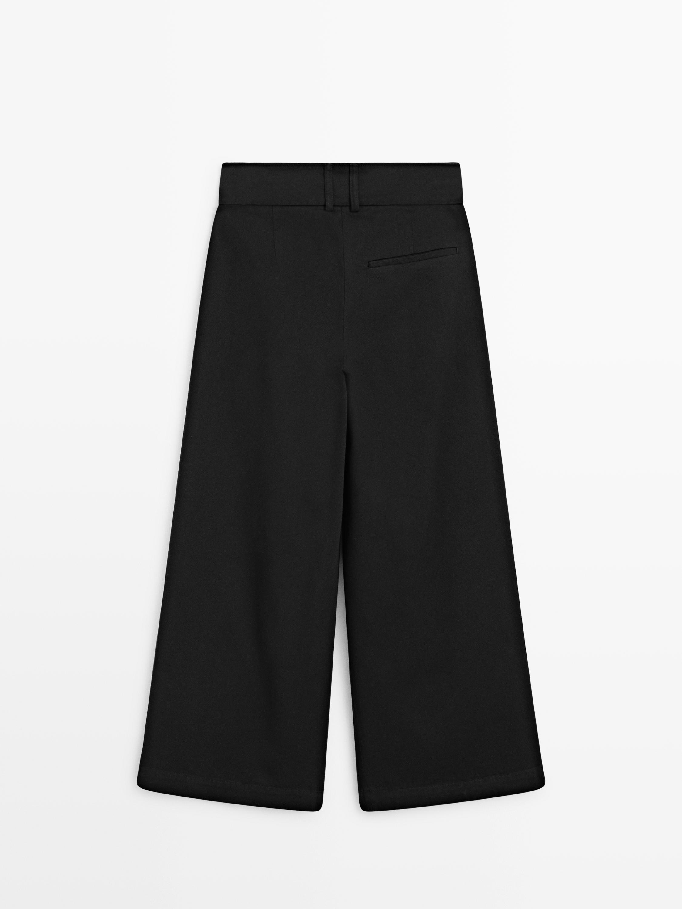 Pantaloni con pince wide leg