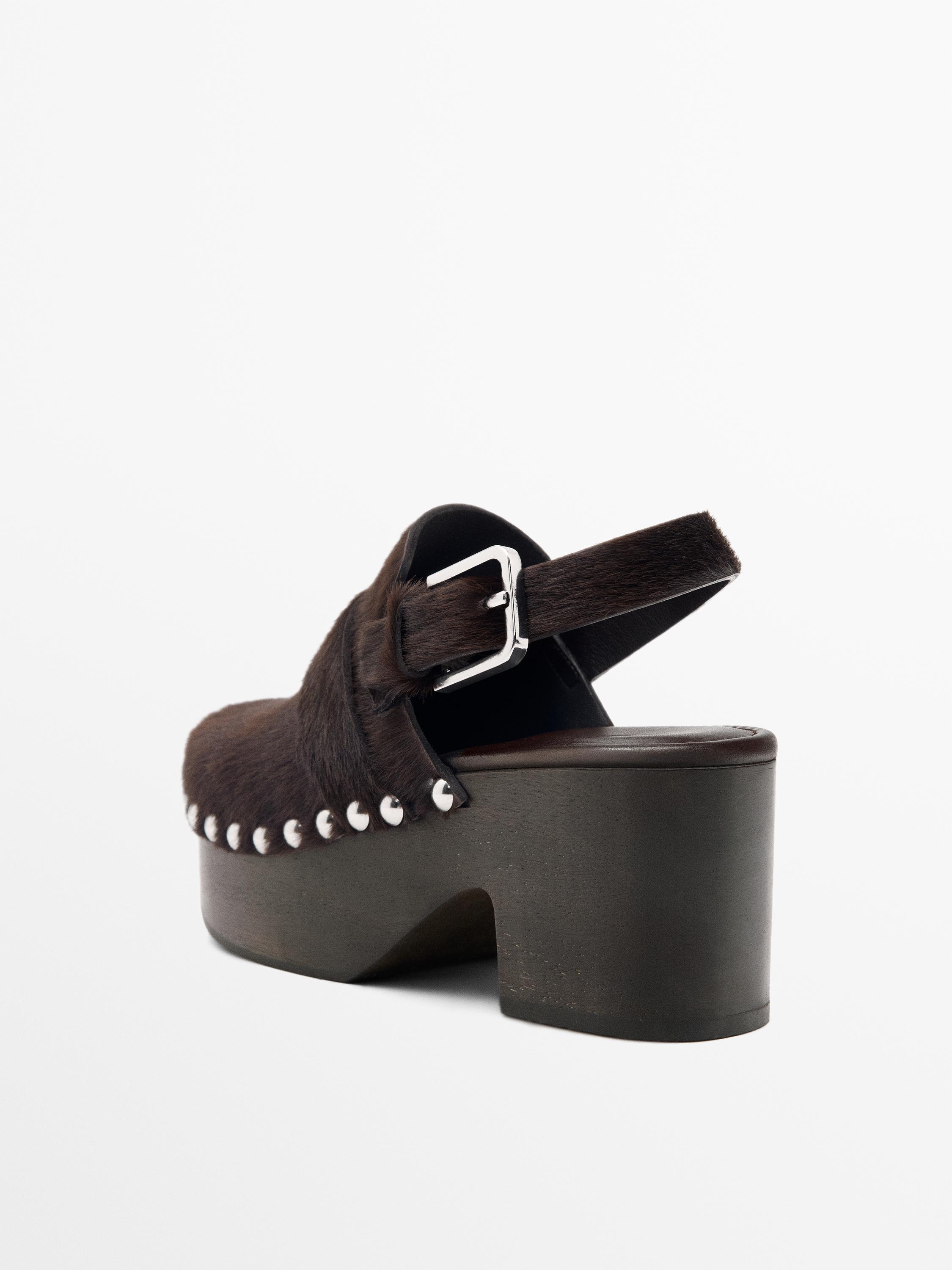 Hair on leather clogs with wooden sole — BROWN