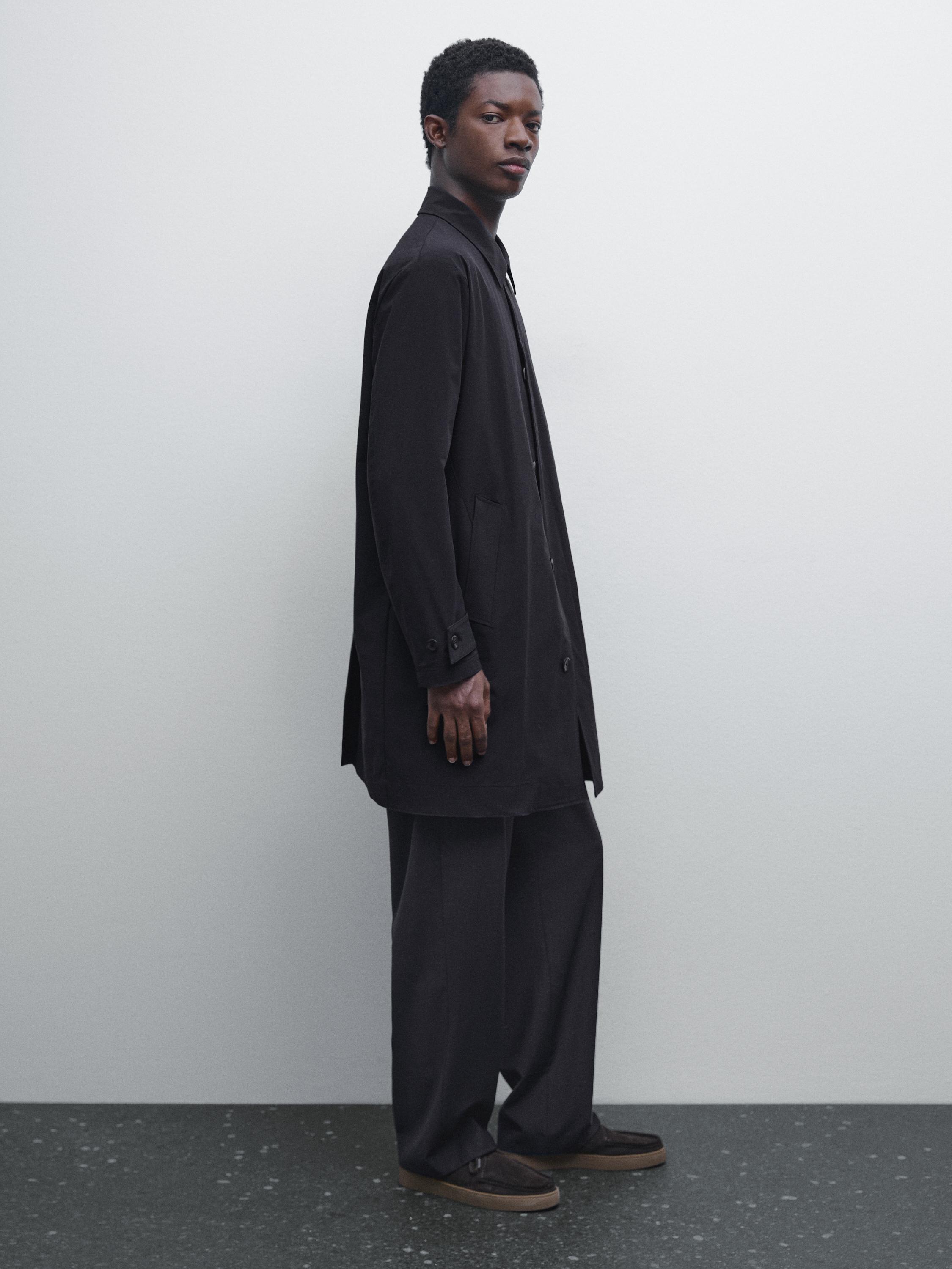 Lightweight trench coat with hidden buttons